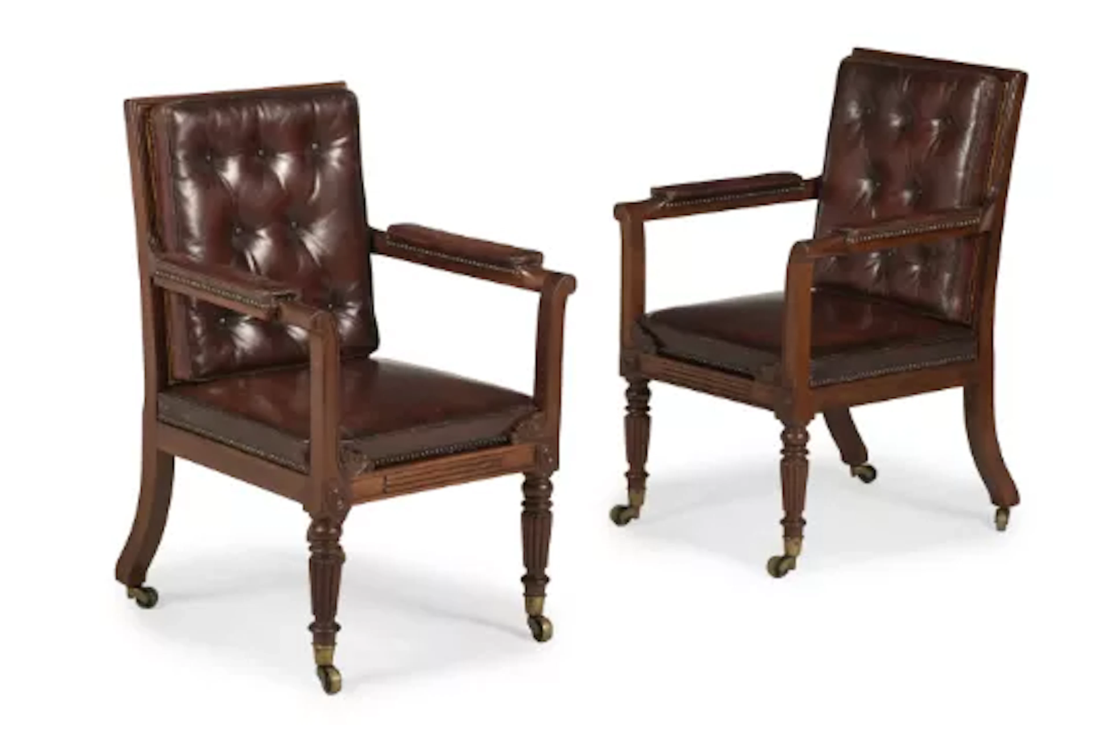 A PAIR OF REGENCY MAHOGANY LIBRARY BERGERE ARMCHAIRS, ATTRIBUTED TO