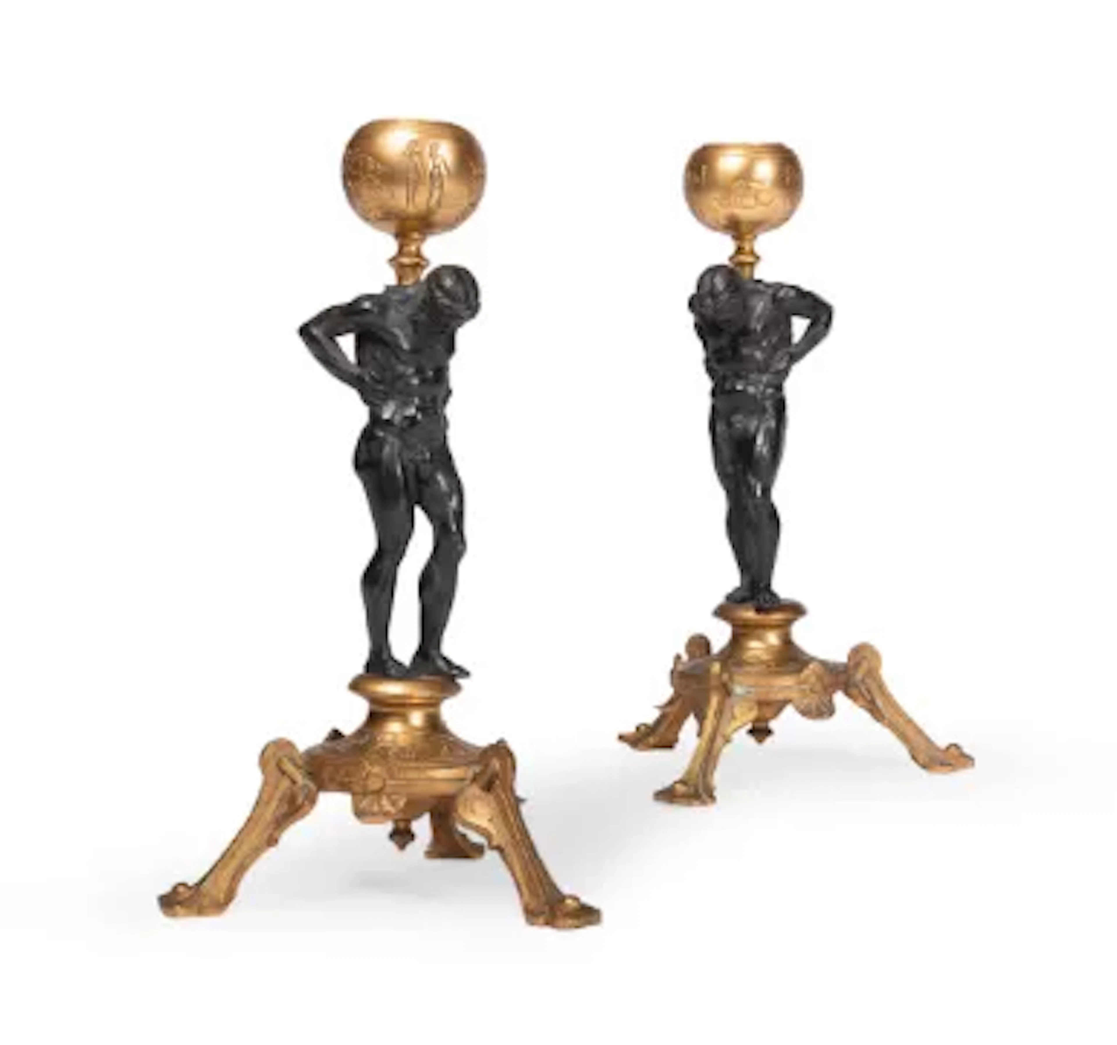 A PAIR OF FRENCH GILT AND PATINATED BRONZE ATLAS CANDLESTICKS, LATE