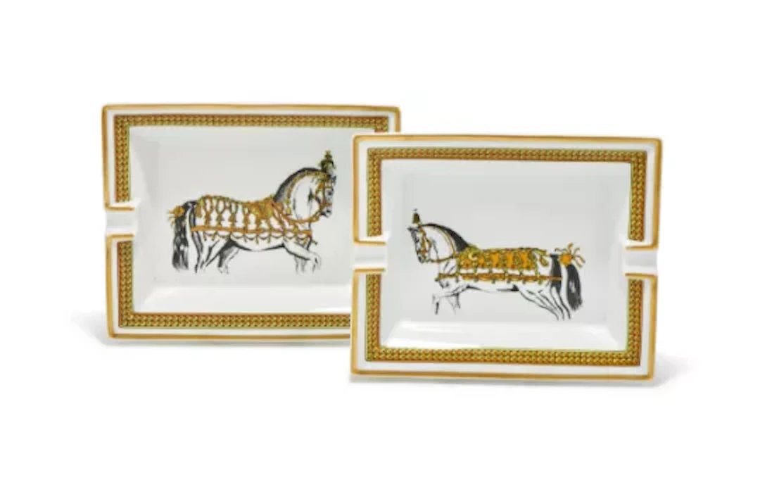 HERMÈS, A PAIR OF PORCELAIN VIDE POCHE