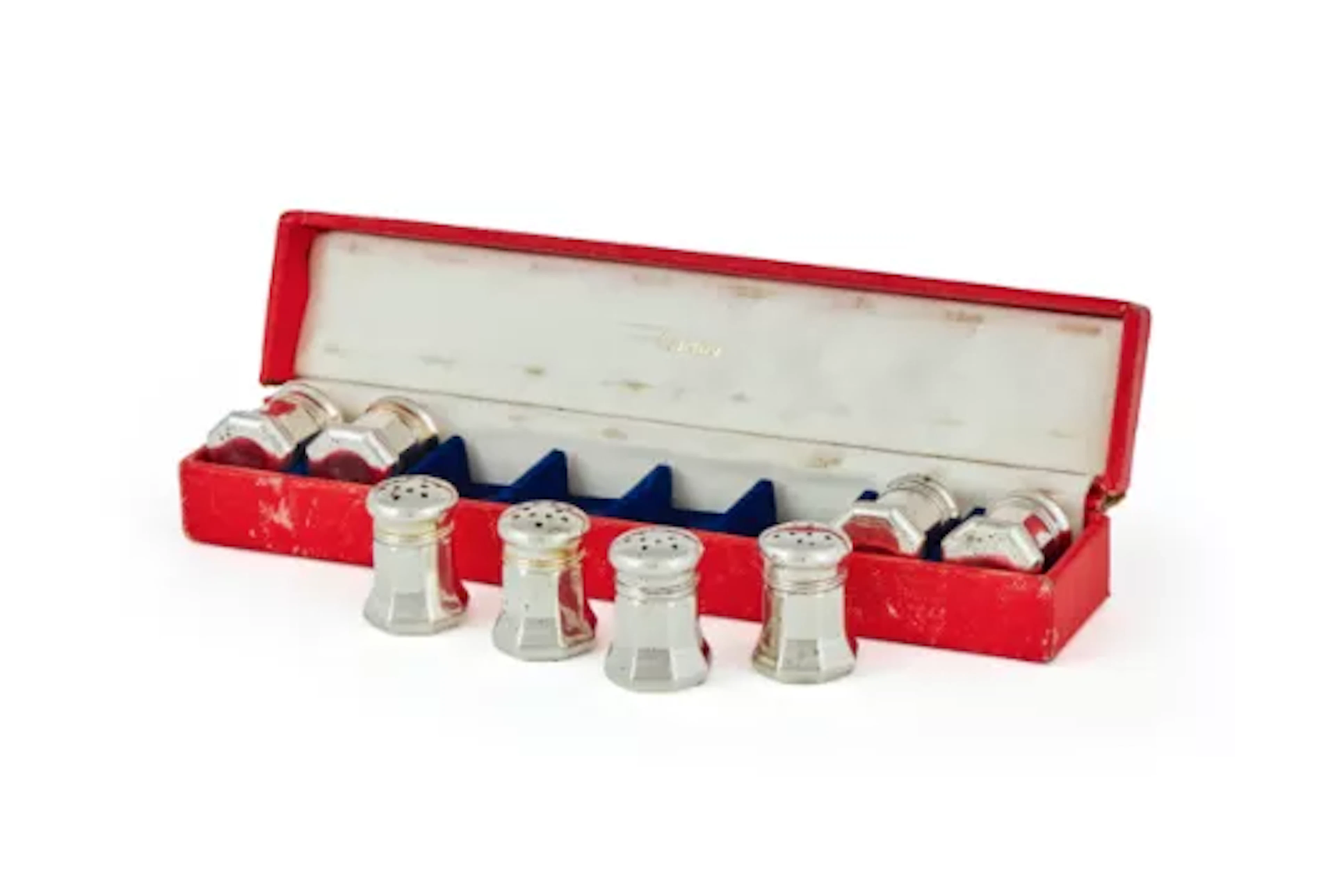 CARTIER, A CASED SET OF EIGHT AMERICAN SILVER AND SILVER GILT SALT