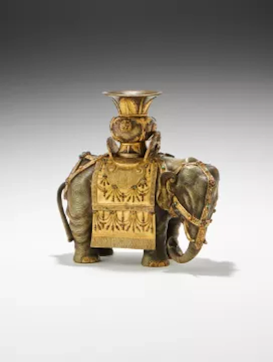 Y A fine Chinese Imperial bronze caparisoned 'elephant and vase'