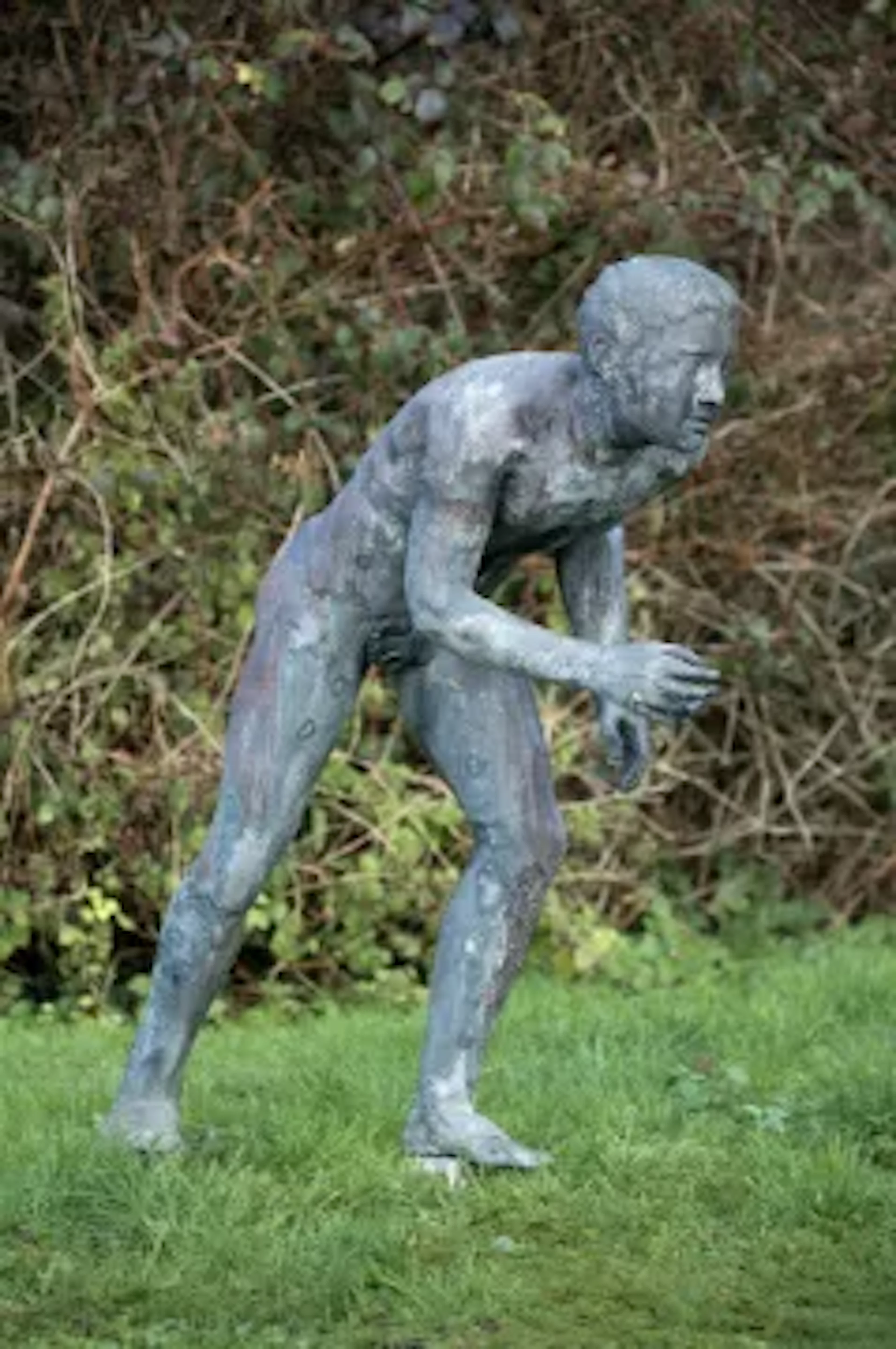 AFTER THE ANTIQUE, A LARGE LEAD FIGURE OF THE YOUNG ATHLETE RUNNER