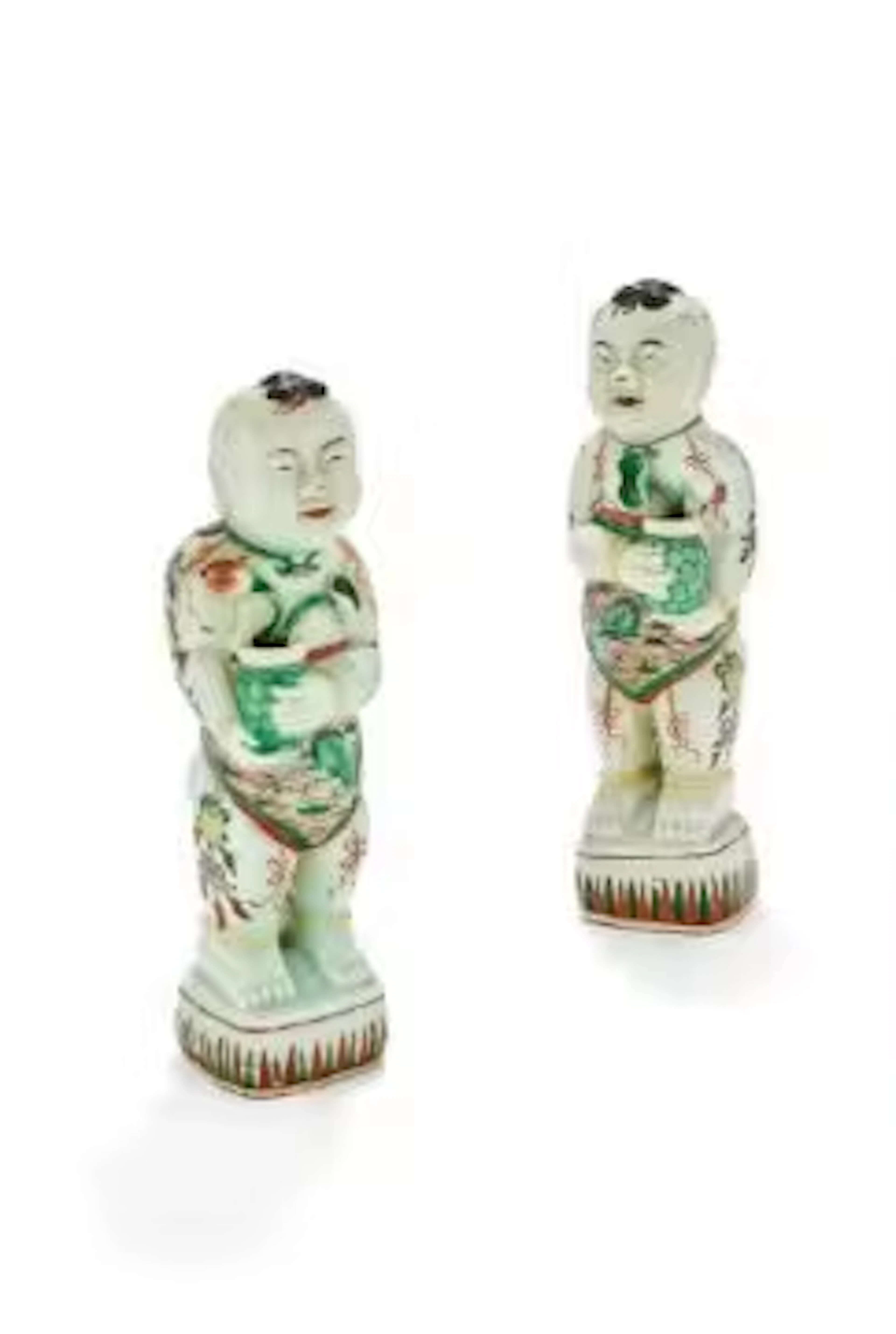 Two Chinese porcelain wucai standing figures of boys