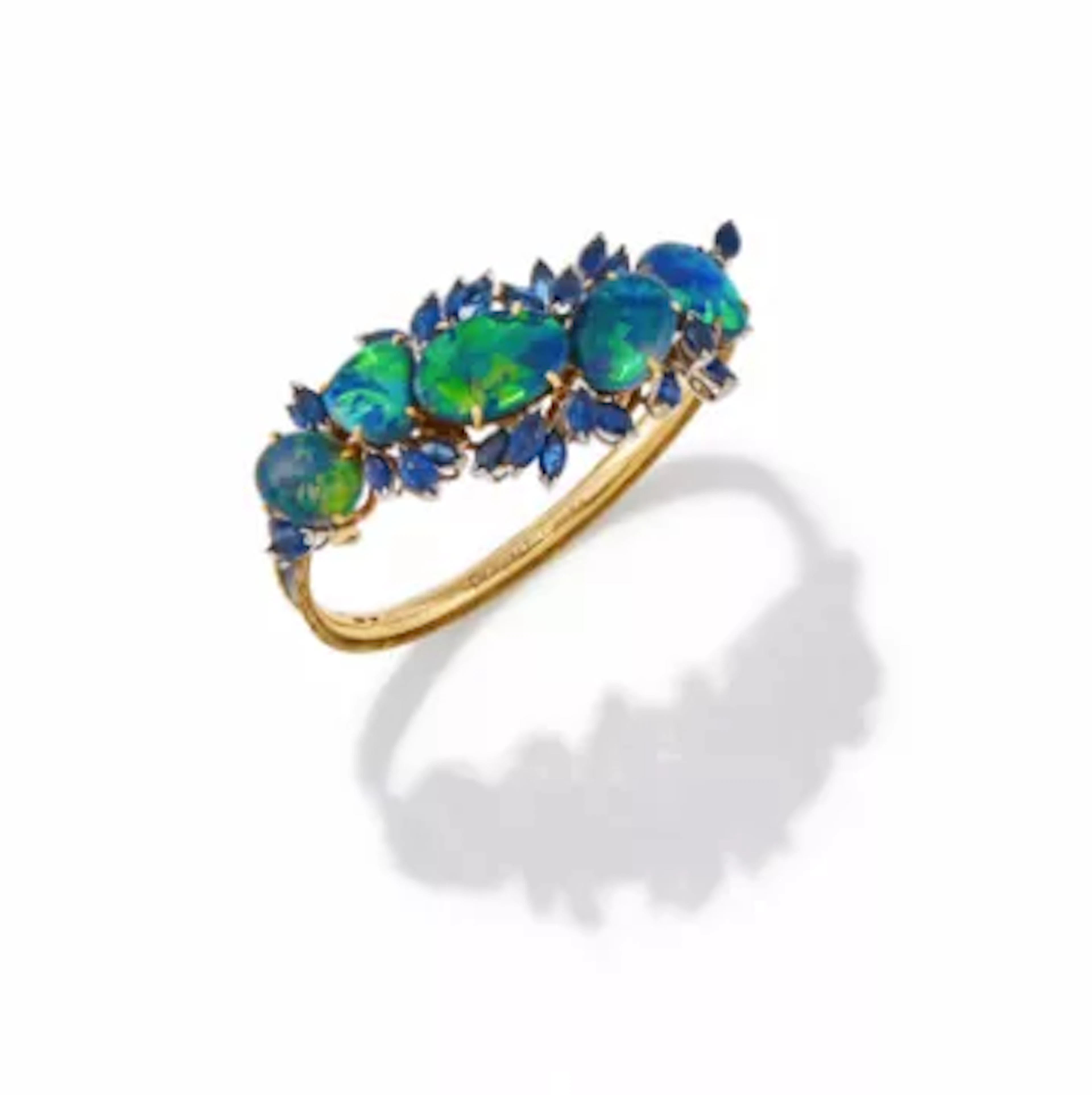 CHAUMET, AN OPAL, SAPPHIRE AND ENAMEL BANGLE, LONDON 1967