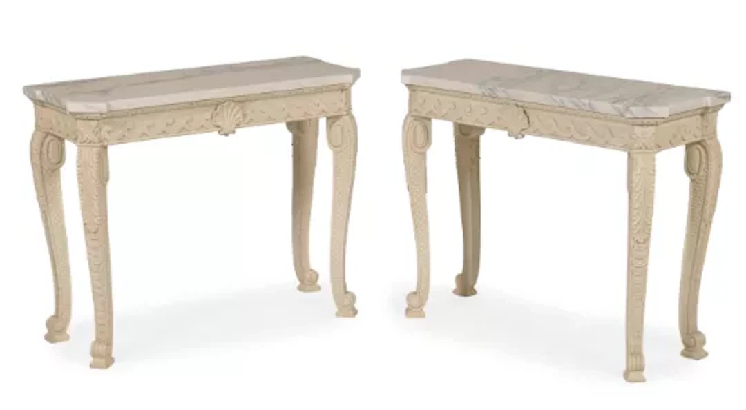 A PAIR OF CARVED WOOD AND GESSO PAINTED CONSOLE TABLES, IN THE MANNER