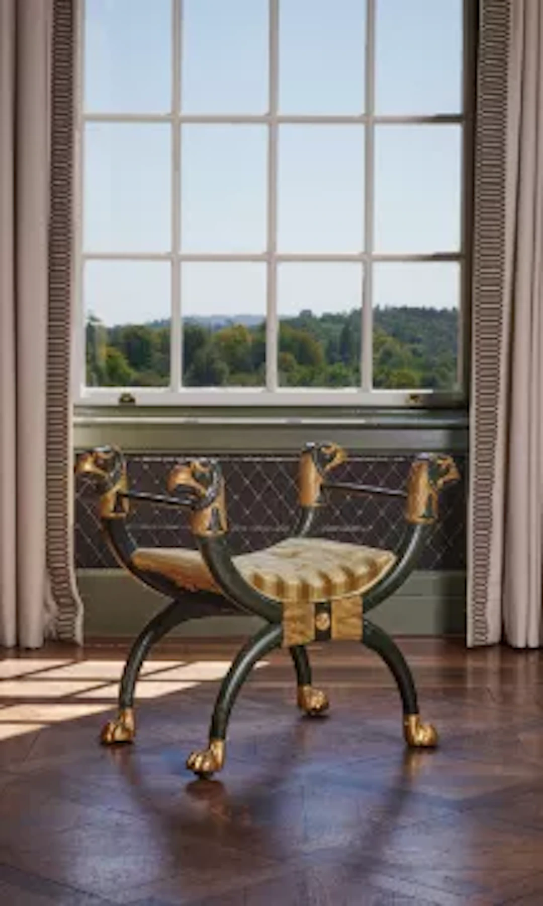 A MATCHED PAIR OF REGENCY BRONZED AND PARCEL GILT X-FRAME STOOLS, CIRCA 1815