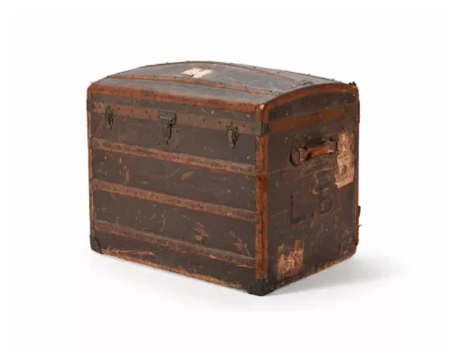 GOYARD, A CANVAS COATED WOOD AND BRASS STEAMER TRUNK