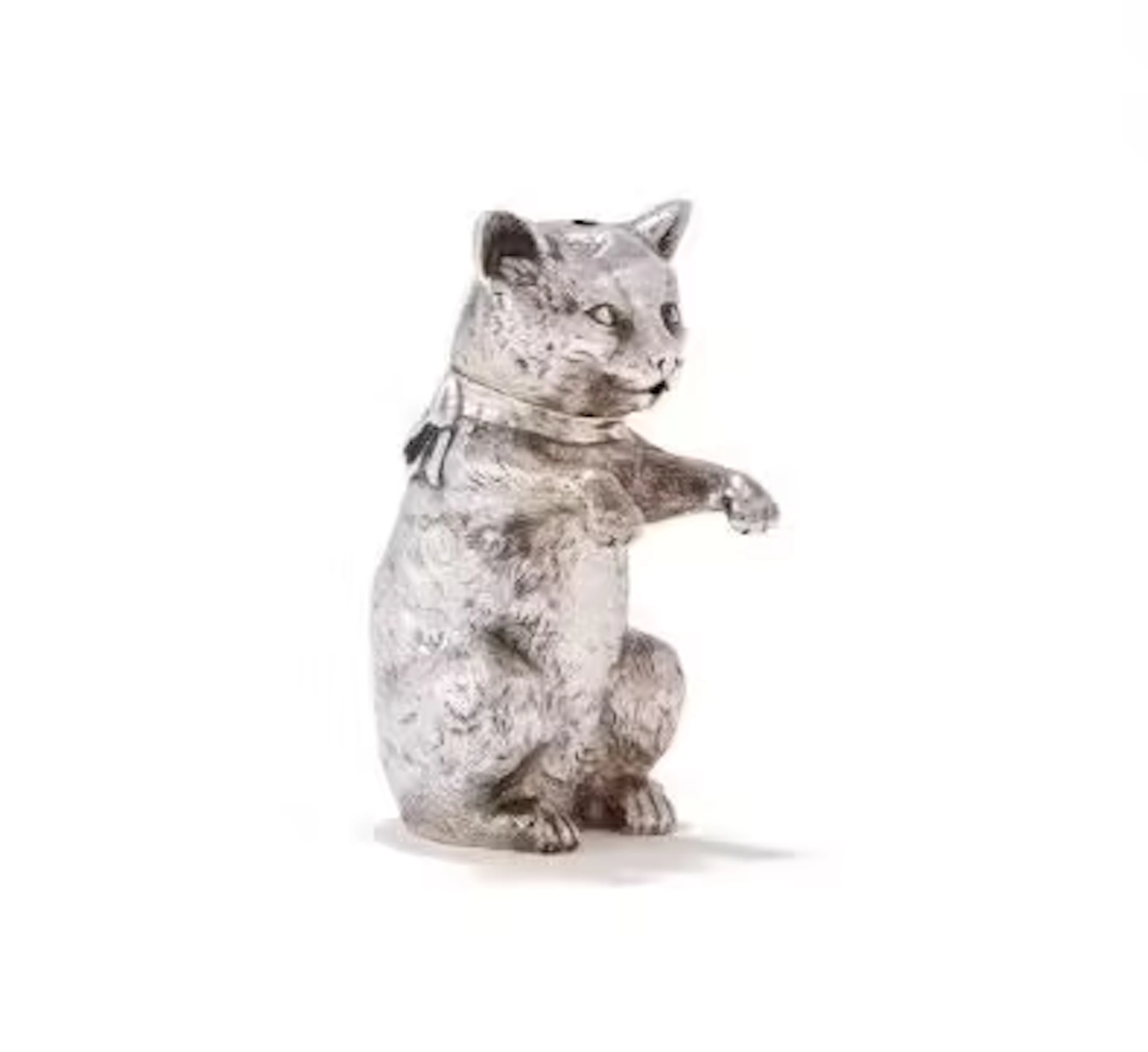 A VICTORIAN NOVELTY SILVER CAT SALT SHAKER