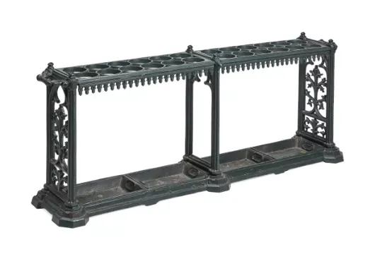 A VICTORIAN CAST IRON AND GREEN PAINTED COUNTRY HOUSE STICK STAND