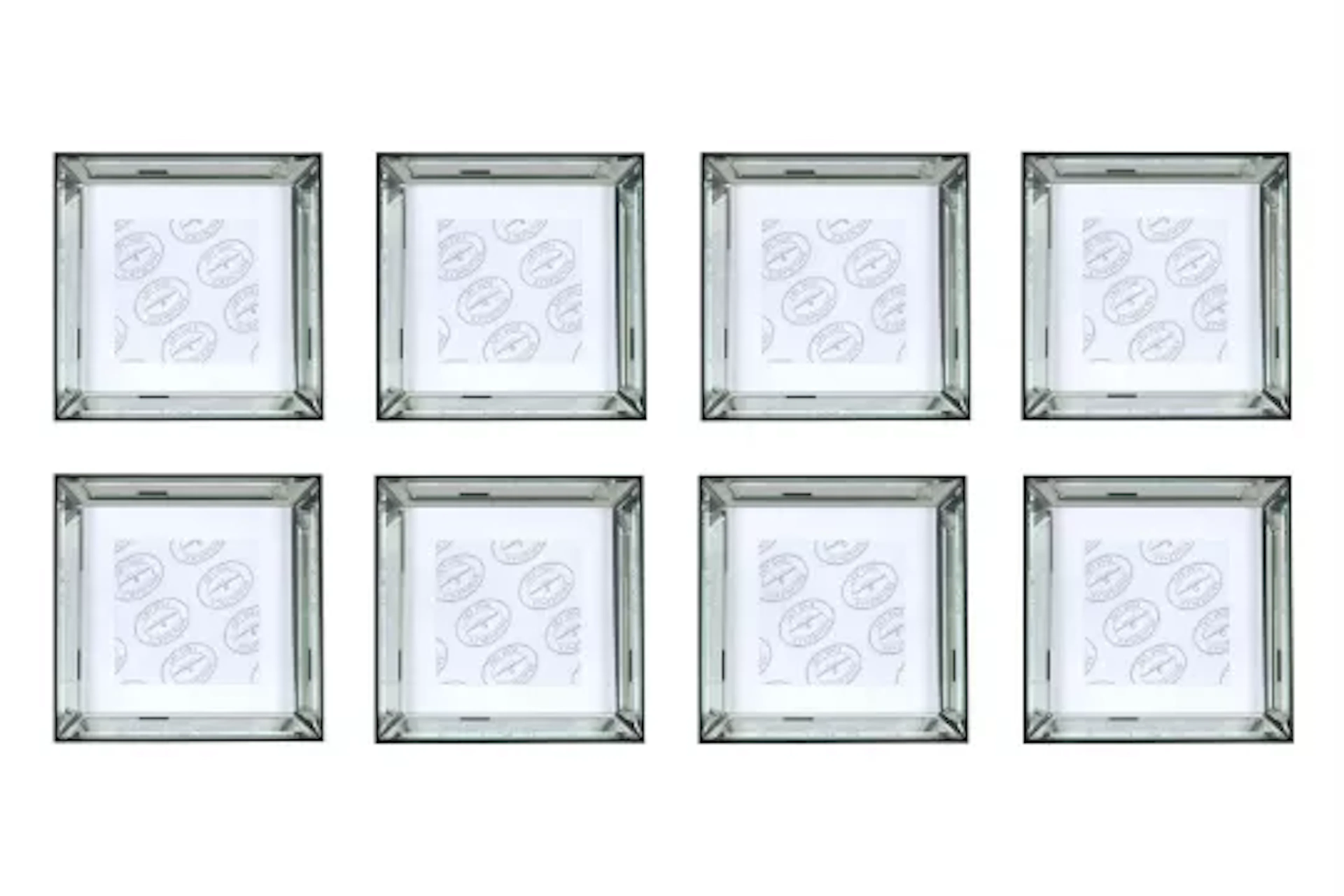 A GROUP OF EIGHT EBONISED AND BEVELL MIRRORED PICTURE FRAMES, OF RECENT