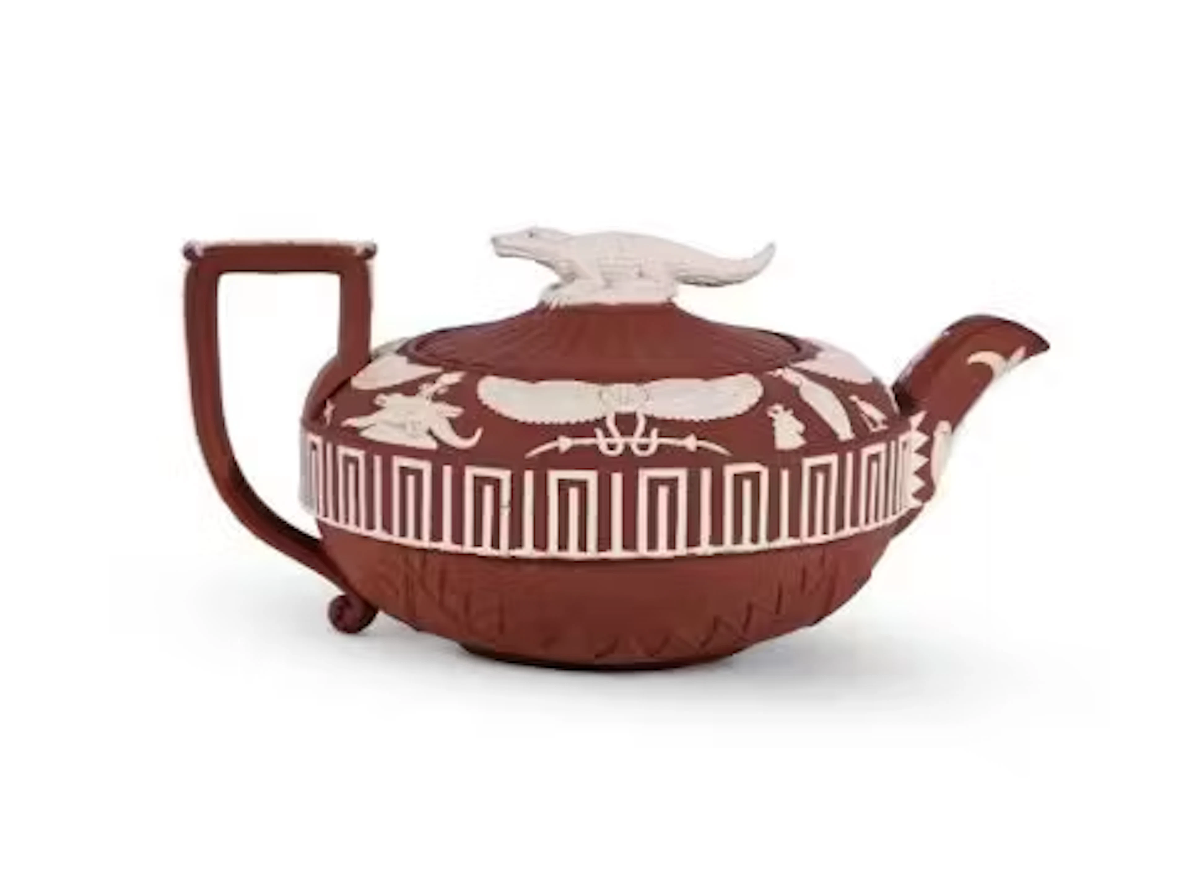 A WEDGWOOD RED DRY-BODIED STONEWARE WHITE-SPRIGGED EGYPTIAN TASTE