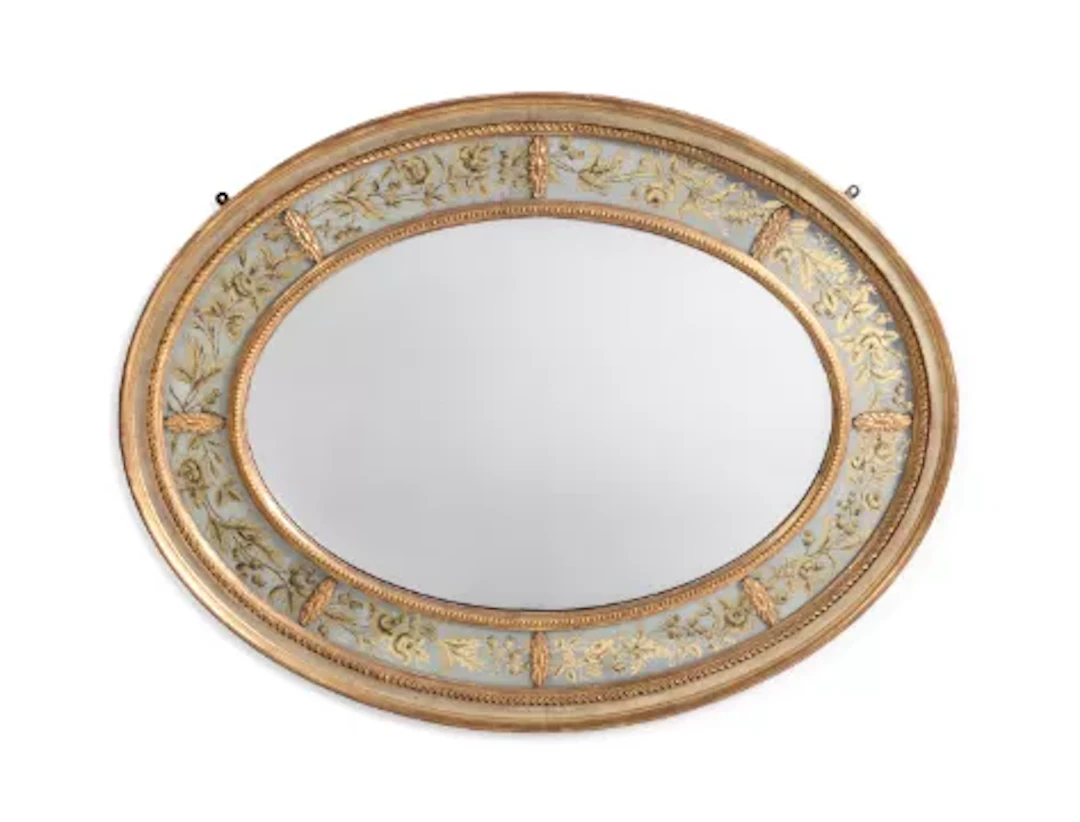 A REGENCY GILTWOOD AND VERRE EGLOMISE MIRROR, EARLY 19TH CENTURY