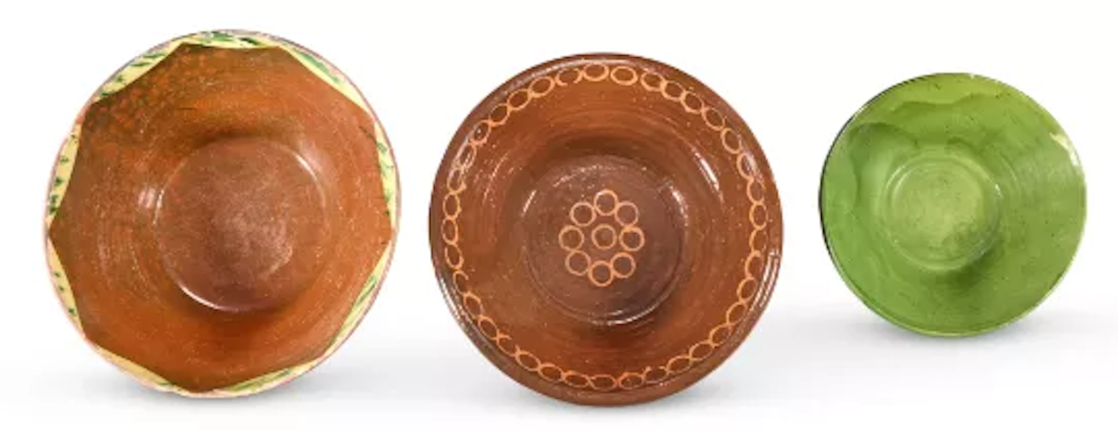 A RUSTIC PARTIALLY GLAZED POTTERY TIAN OR CONICAL MIXING BOWL, PROBABLY