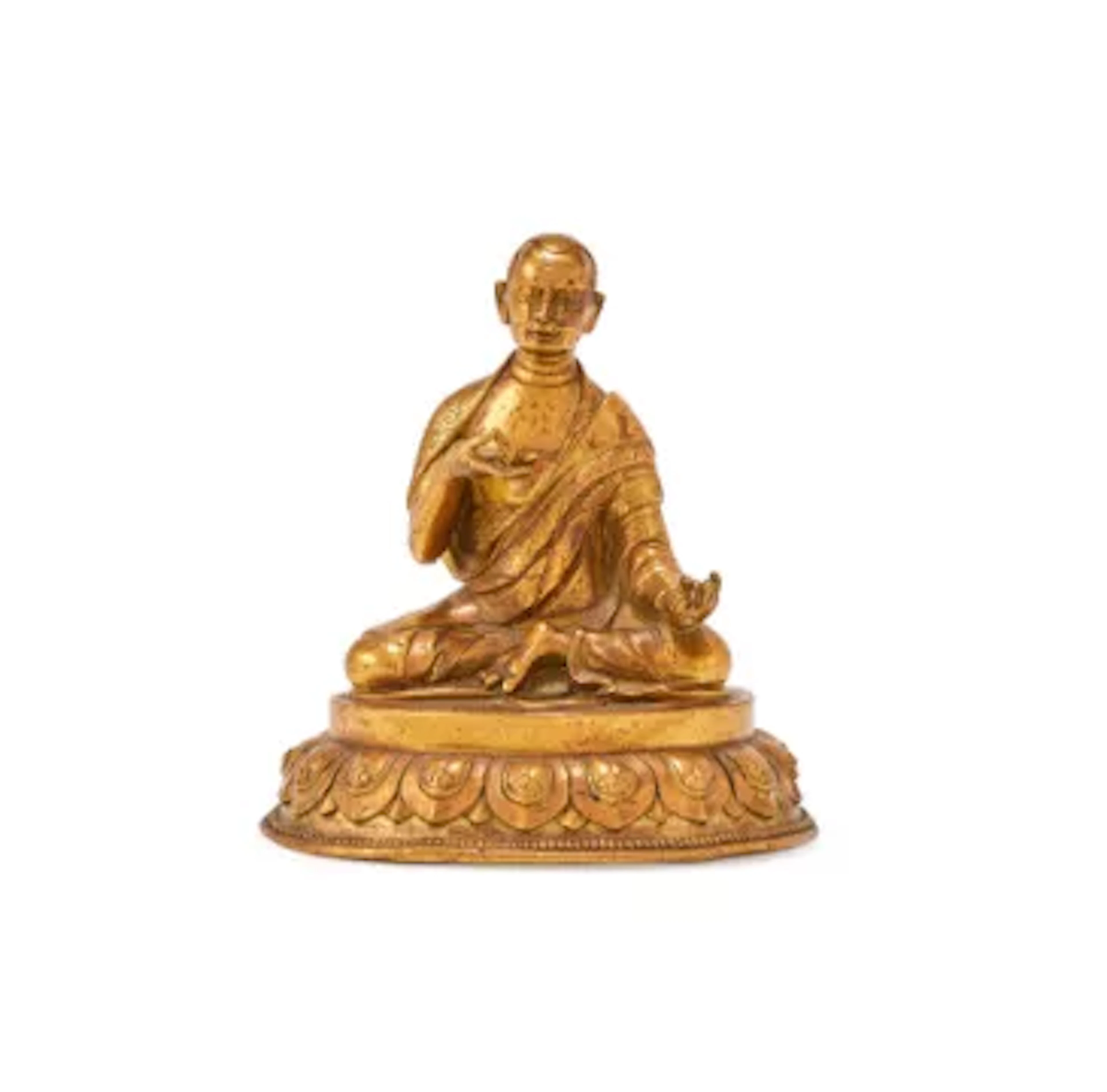A Sino-Tibetan gilt bronze figure of seated Arahat, 19th century