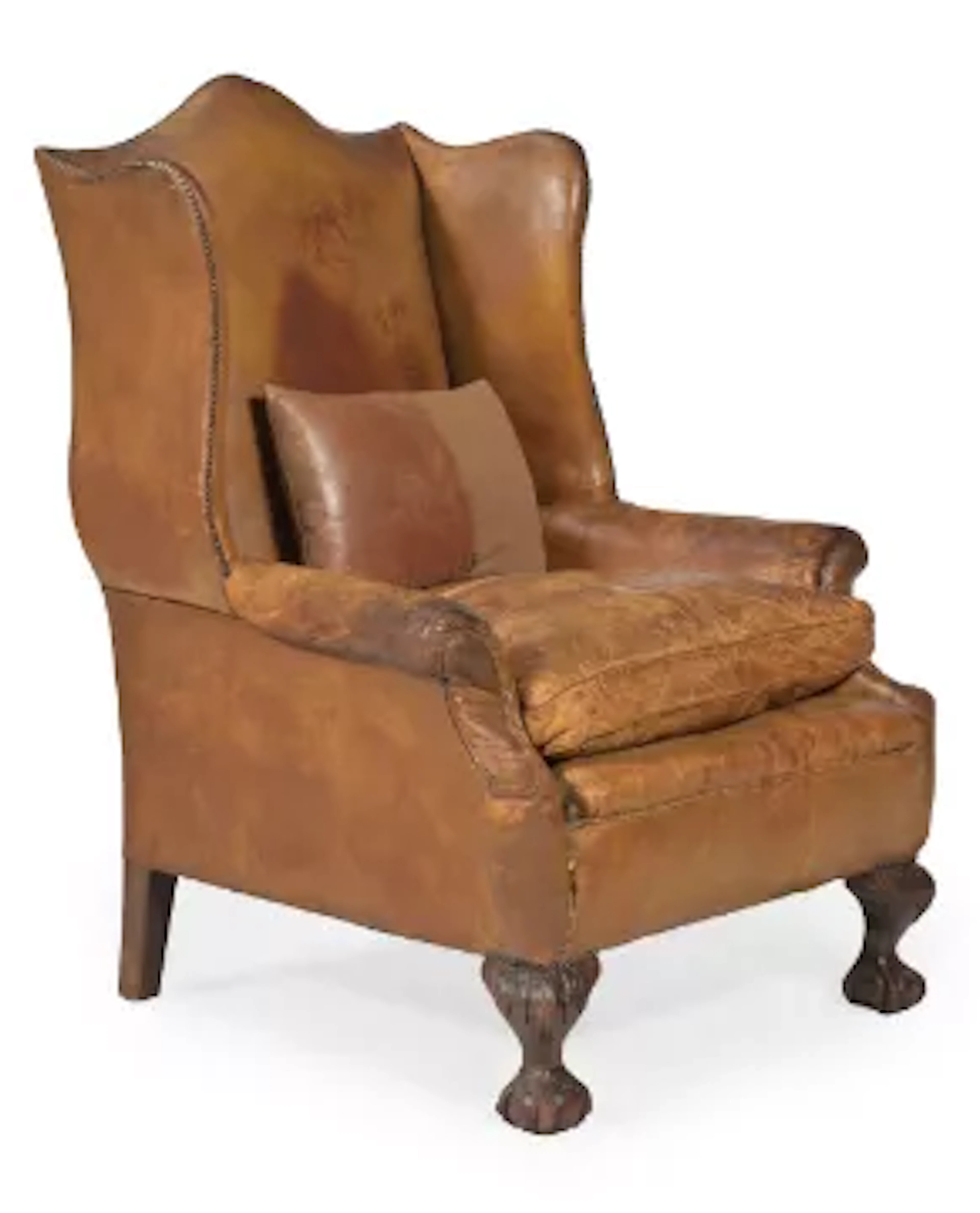 A HIDE UPHOLSTERED WING ARMCHAIR, IN GEORGE II STYLE, FIRST HALF 20TH CENTURY