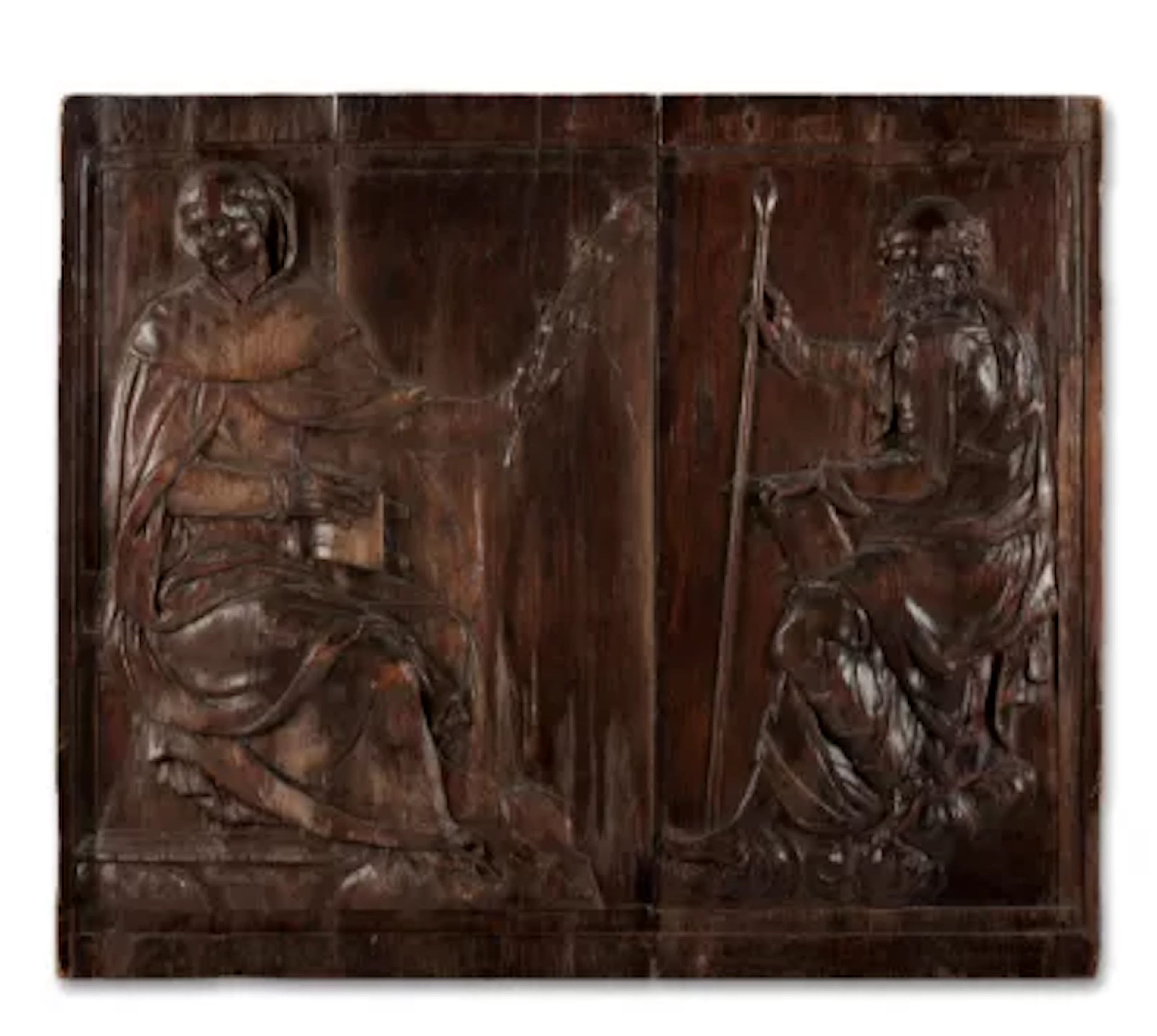 A CARVED WOOD RELIEF DEPICTING SAINTS GREGORY AND MATTHEW, SPANISH