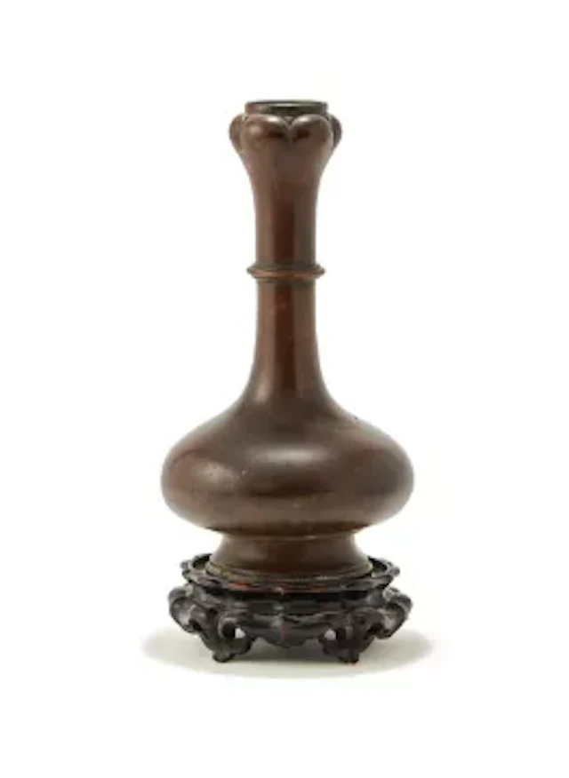 A Chinese bronze garlic-mouth vase, Han dynasty (206 BC-AD 220)