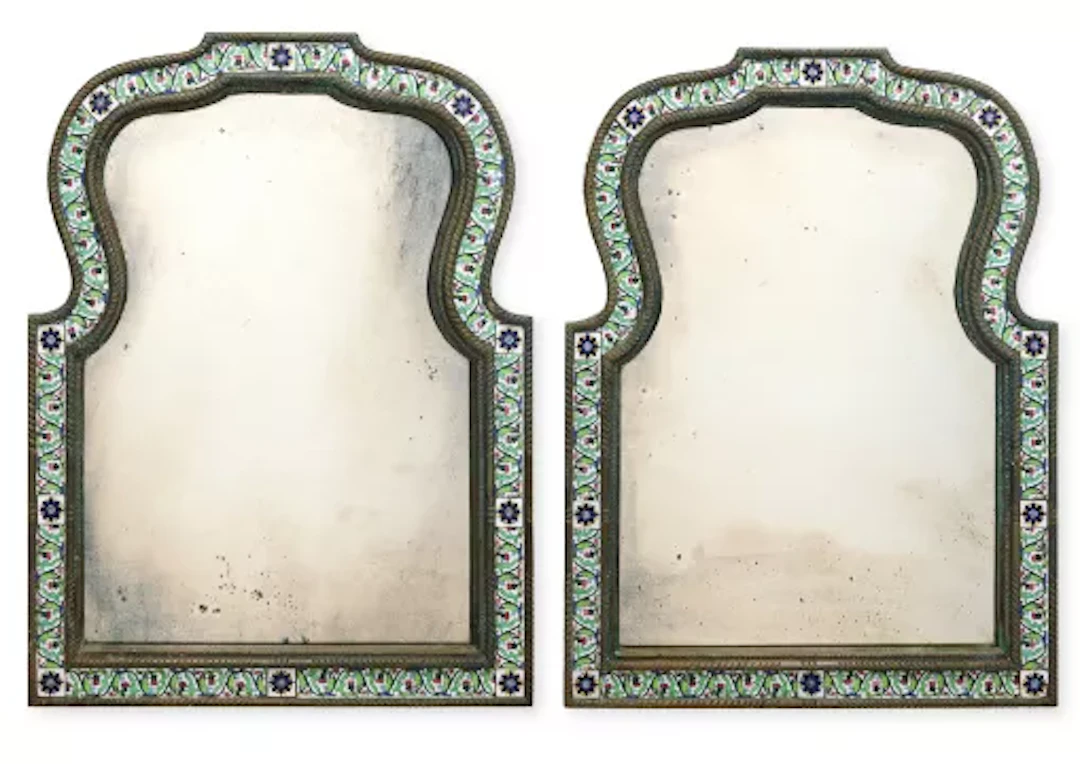 A PAIR OF BRASS AND POLYCHROME ENAMEL DECORATED MIRRORS, INDIAN, LATE