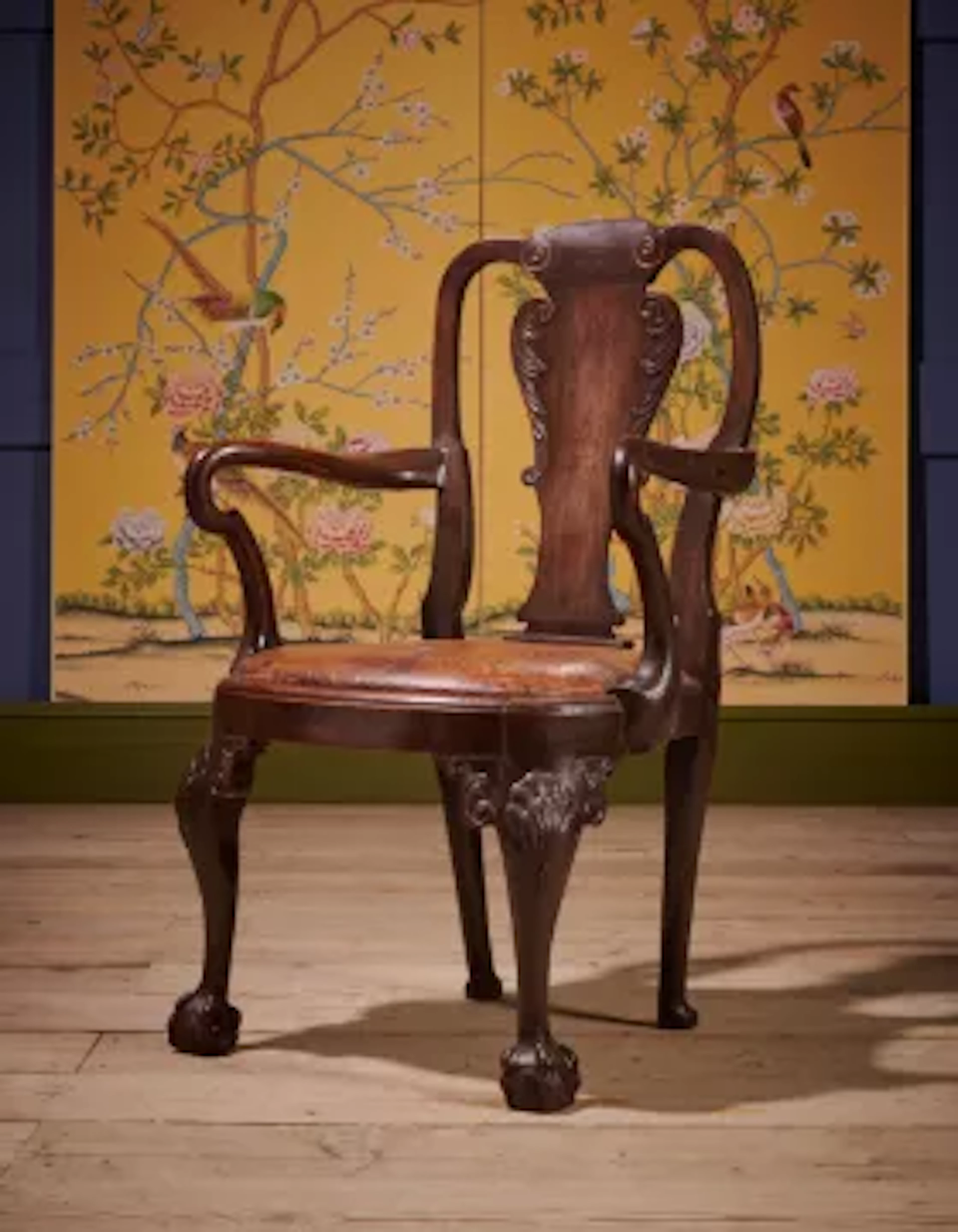 A GEORGE I 'RED WALNUT' OPEN ARMCHAIR, IRISH, CIRCA 1720