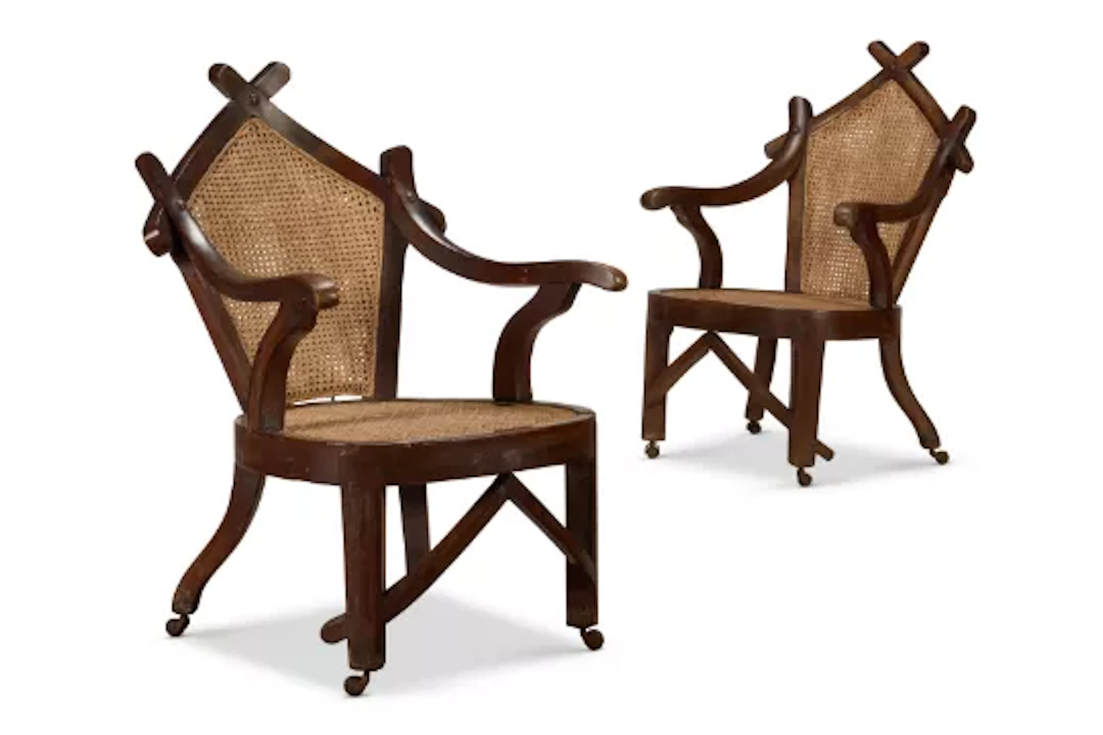 A PAIR OF HARDWOOD AND CANED `GOTHIC' ARMCHAIRS, LATE 19TH CENTURY