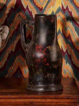 A POLYCHROME DECORATED LEATHER BOMBARD OR 'BLACKJACK' JUG, CIRCA 1700