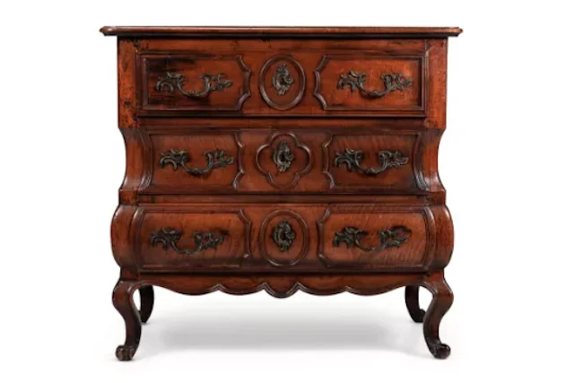 A LOUIS XV PROVINCIAL WALNUT BOMBE COMMODE, MID 18TH CENTURY