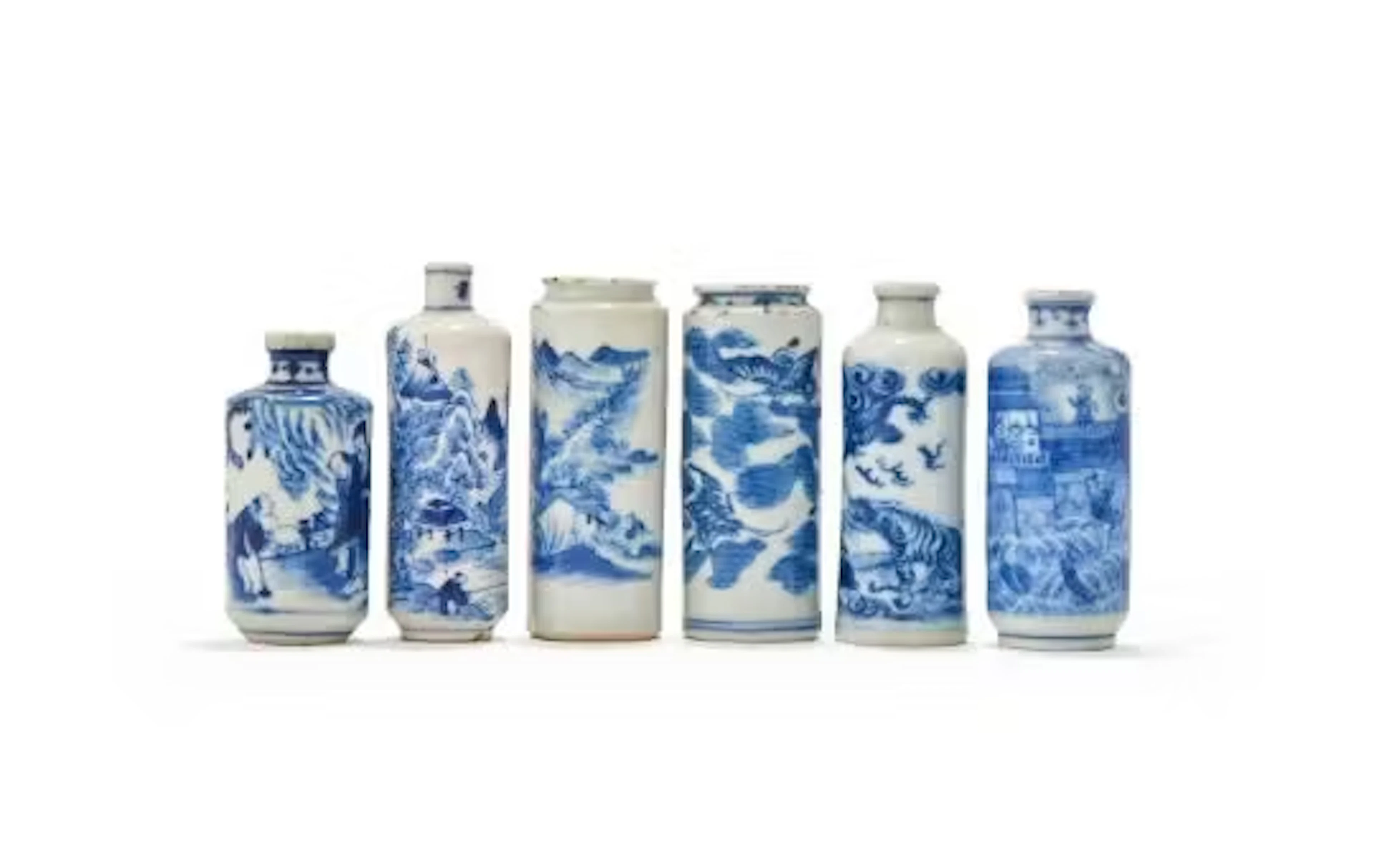 A group of six Chinese blue and white cylindrical snuff bottles