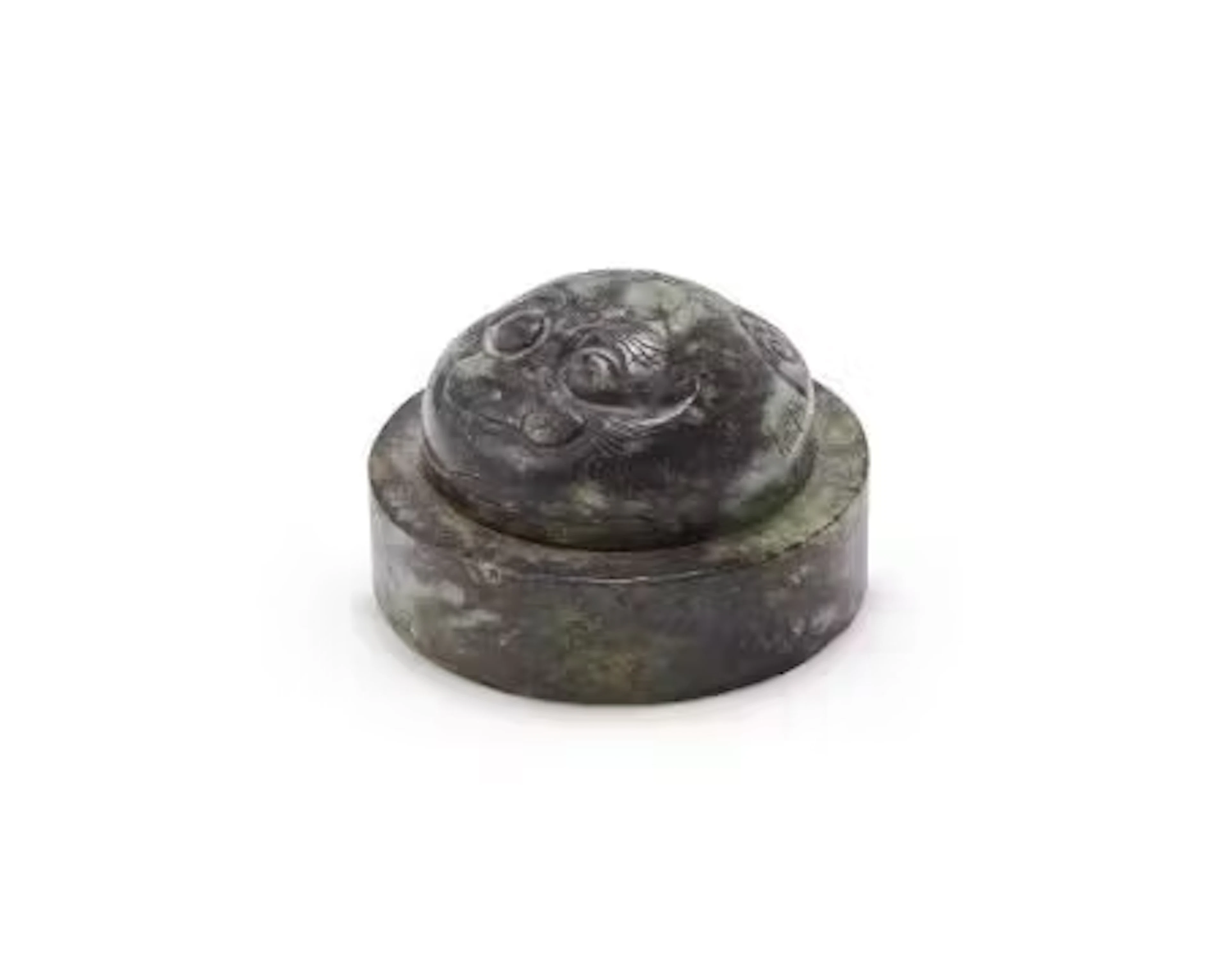 A Chinese carved jade paperweight