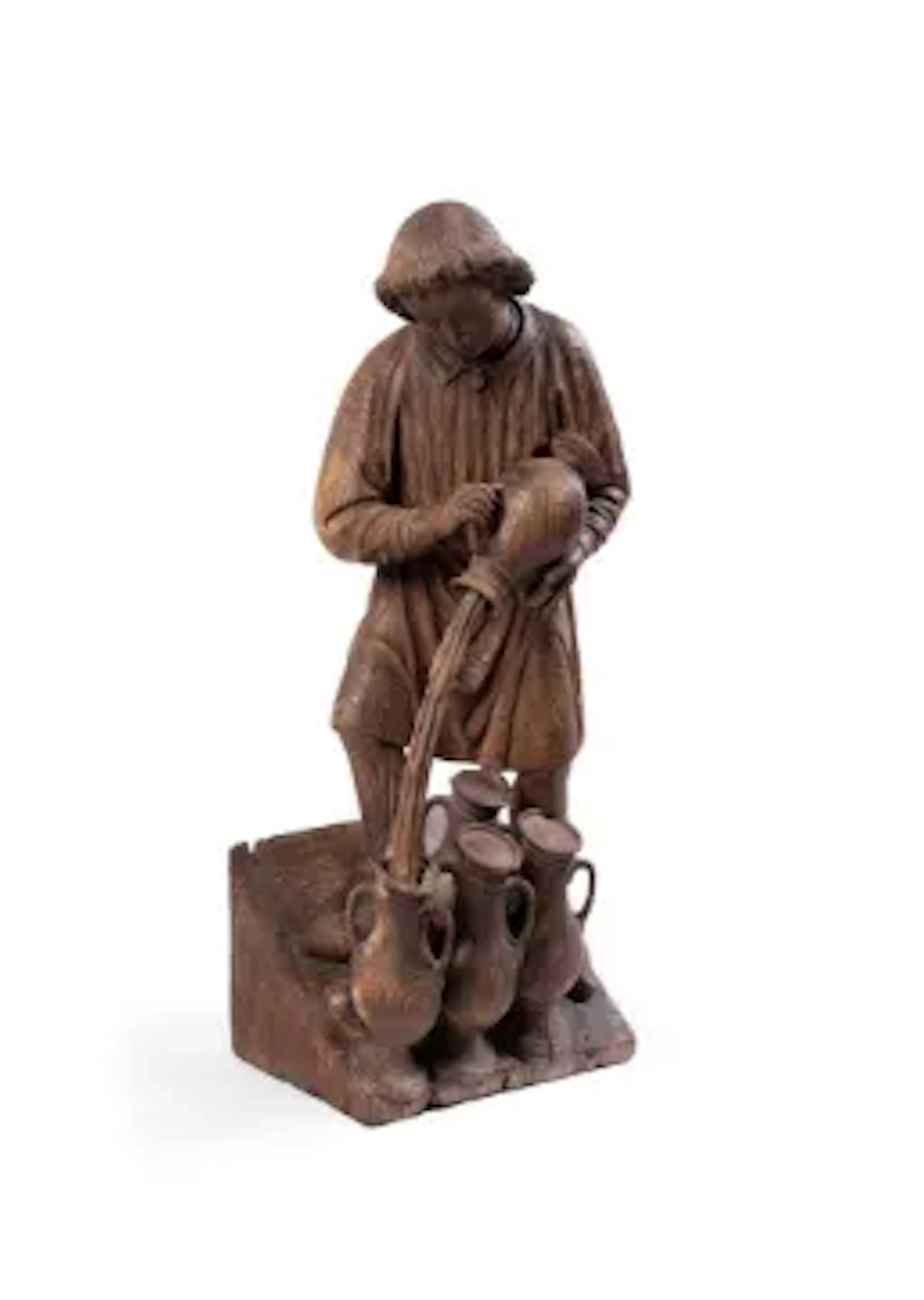 A CARVED OAK FIGURE OF A SERVANT POURING WINE AT THE WEDDING FEAST