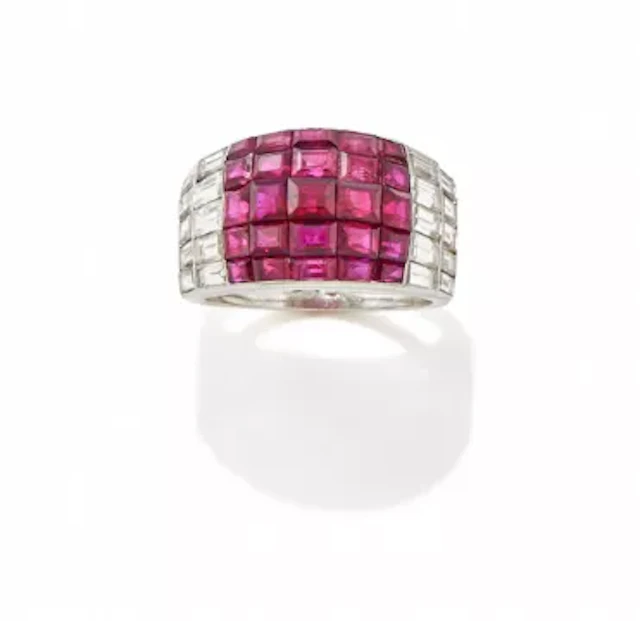 A 1950S RUBY AND DIAMOND DRESS RING