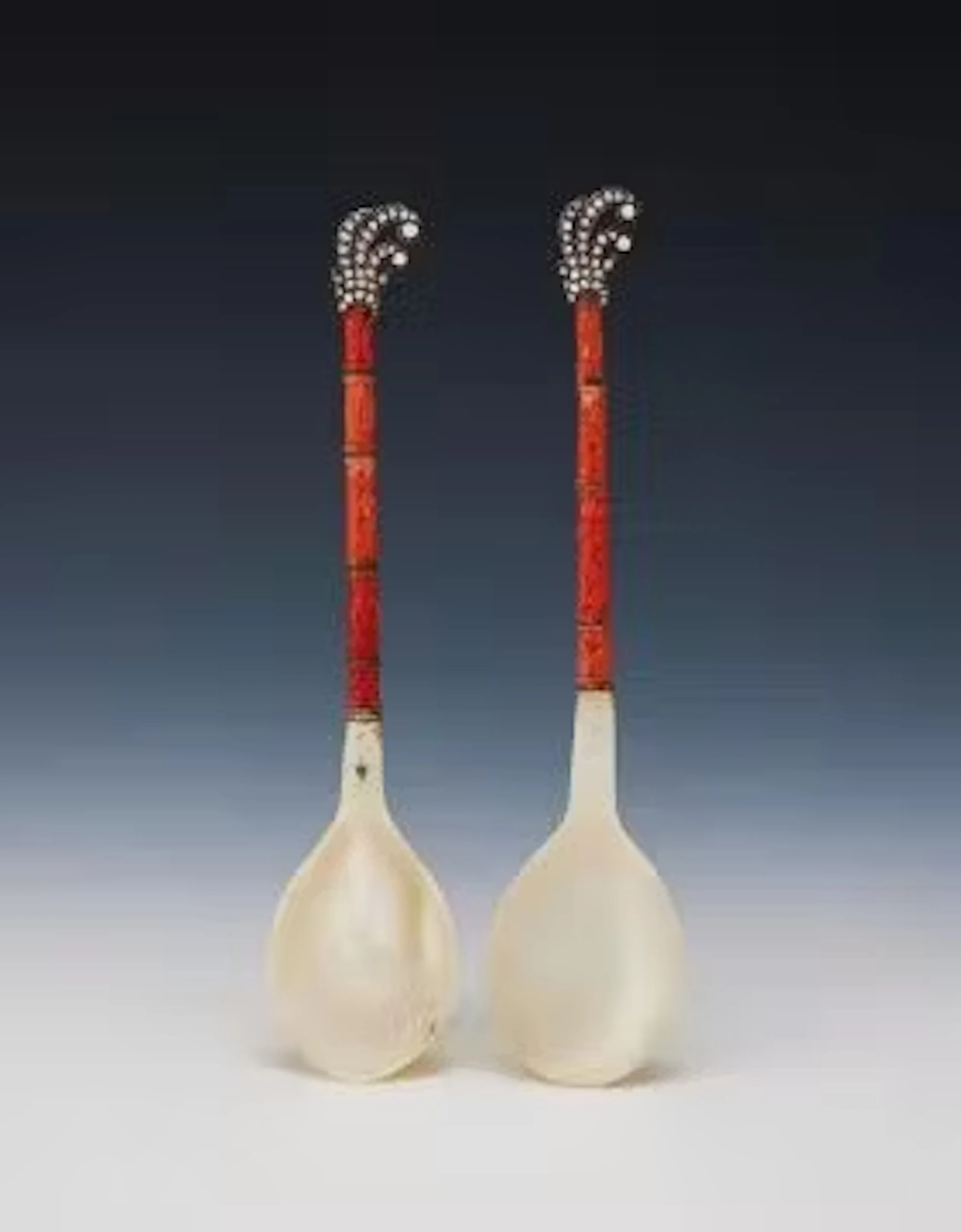 Y TWO MOTHER OF PEARL, CORAL AND DIAMOND SPOONS
