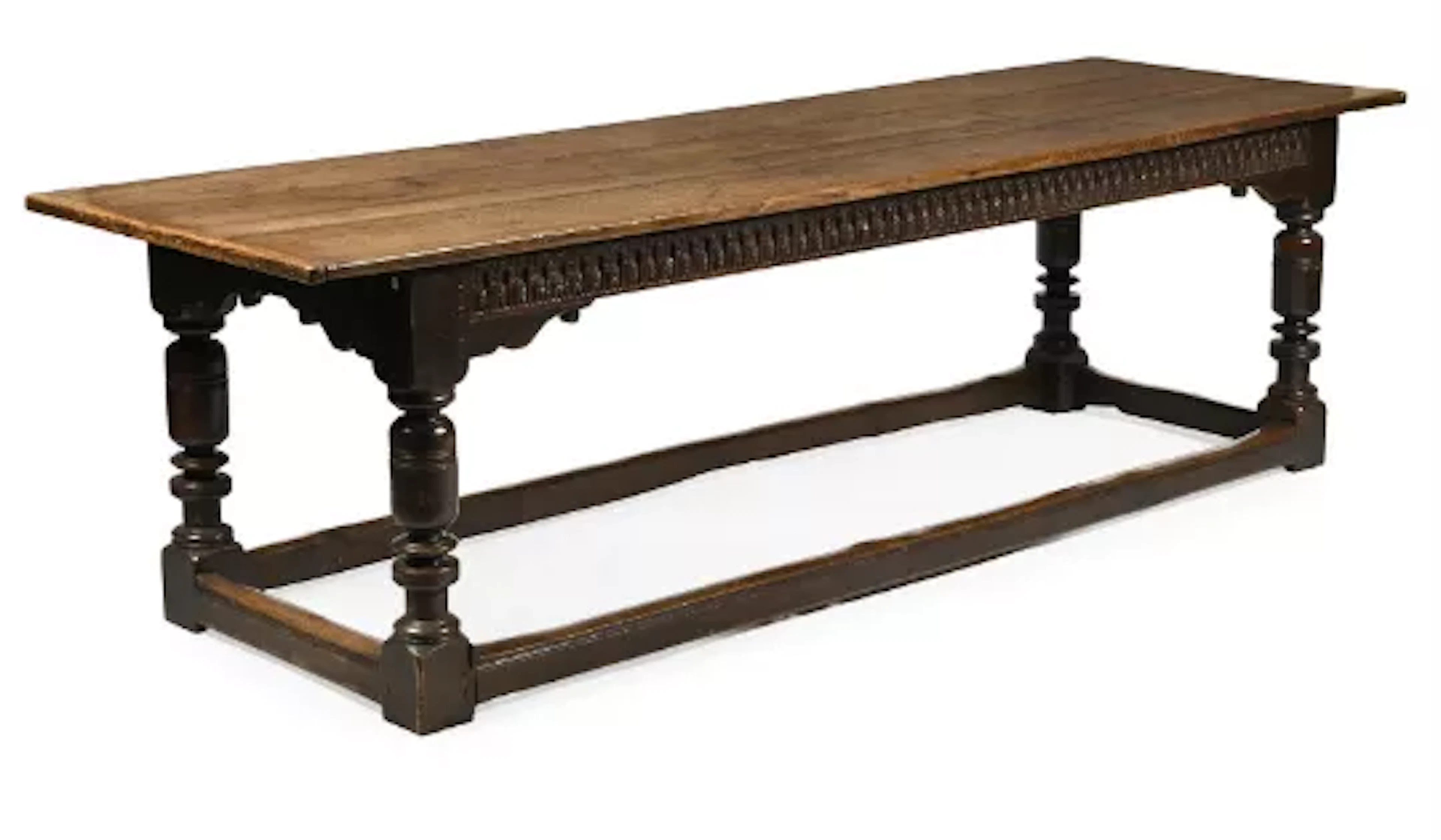 A CHARLES II OAK REFECTORY OR HALL TABLE, CIRCA 1680