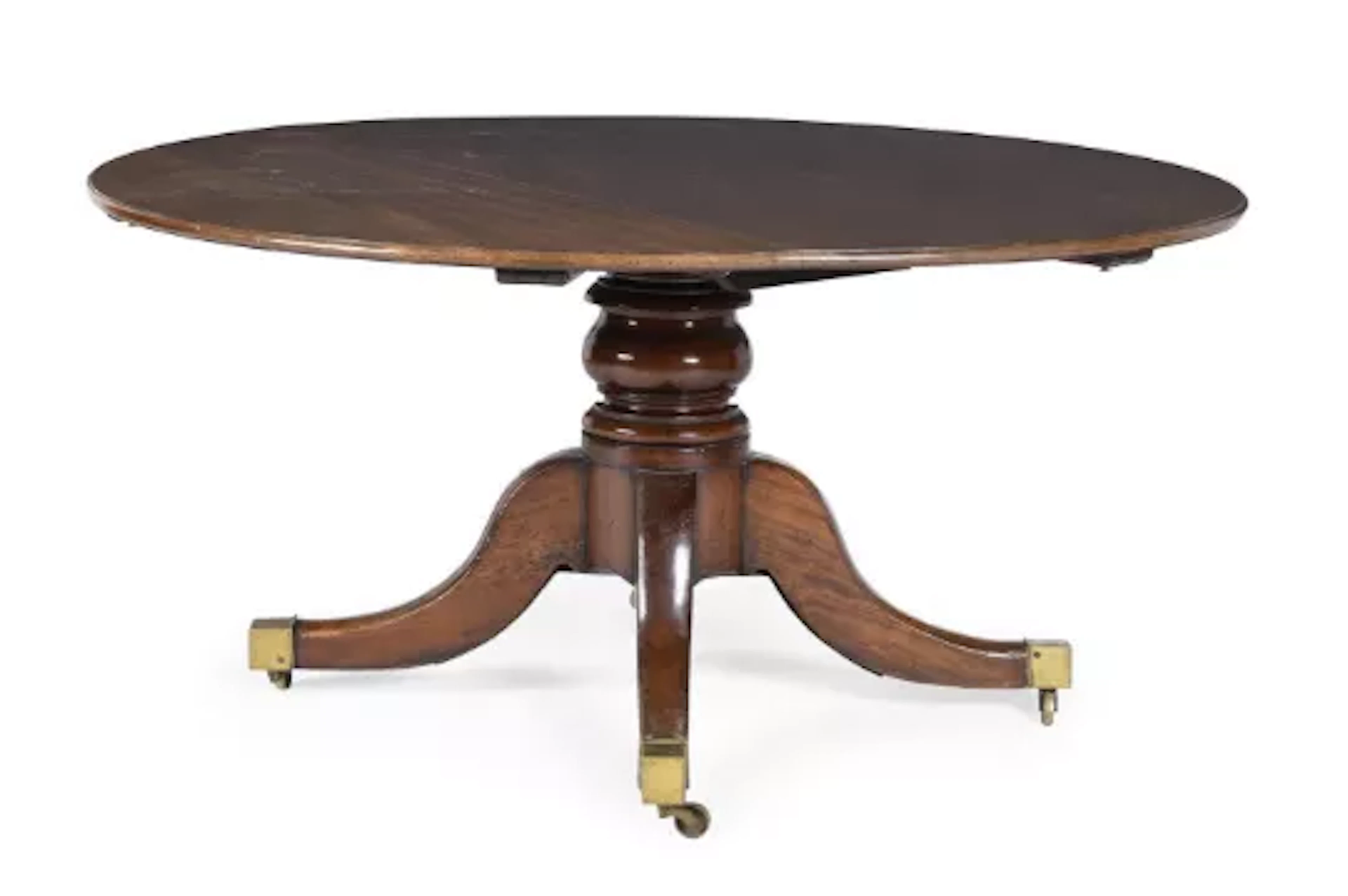 A WILLIAM IV MAHOGANY CONCENTRIC EXTENDING CIRCULAR DINING TABLE, CIRCA 1835