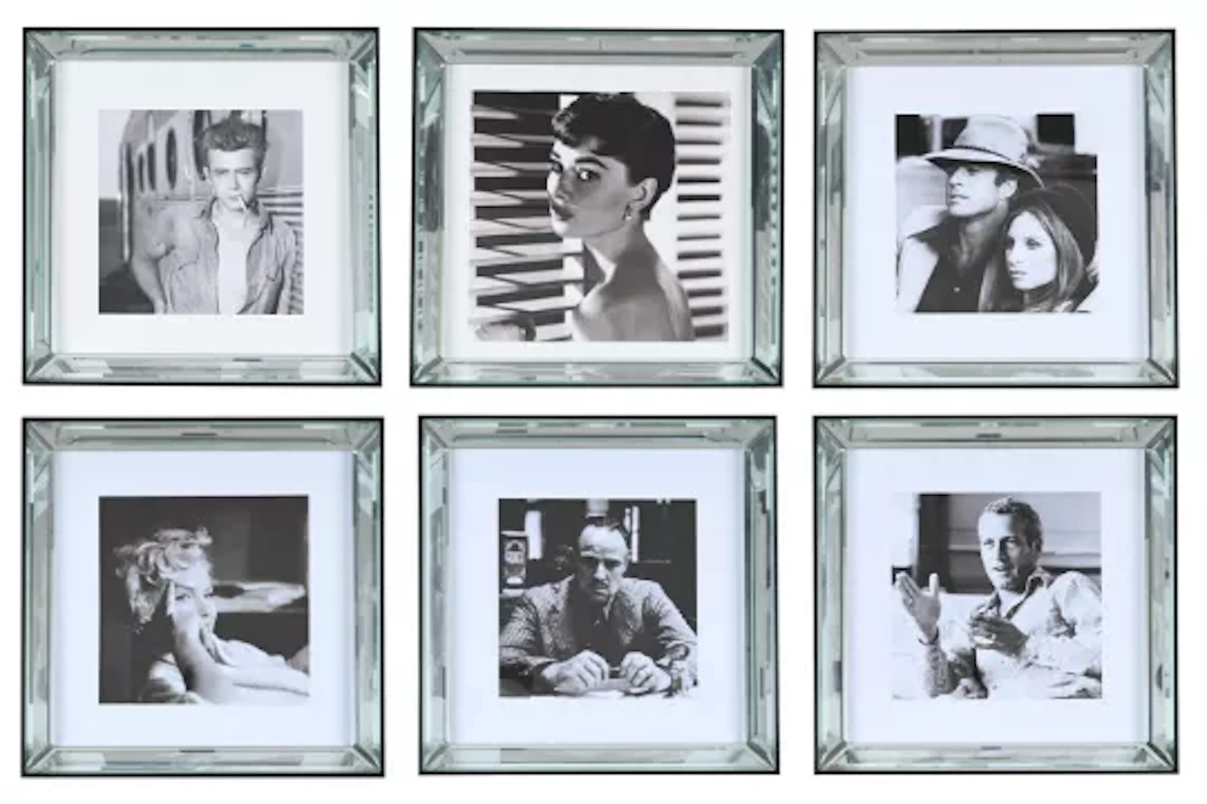 A GROUP OF SIX SQUARE EBONISED AND BEVELL MIRRORED PICTURE FRAMES