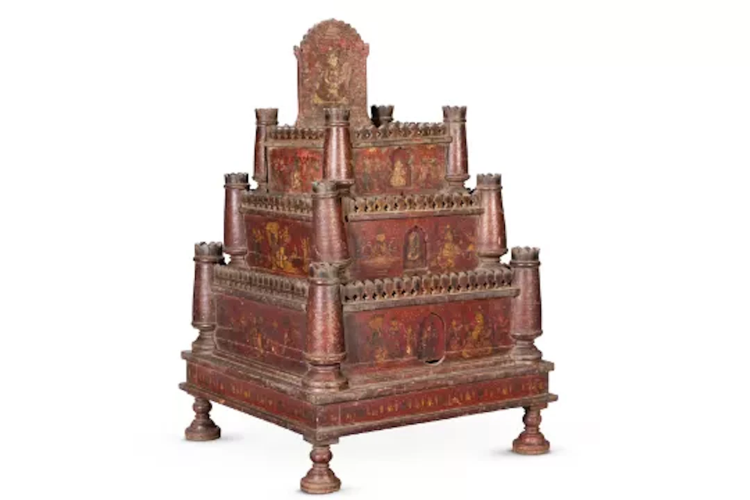 ‡ A LARGE POLYCHROME DECORATED CARVED MODEL OF A RAJASTHANI FORT, 19TH CENTURY