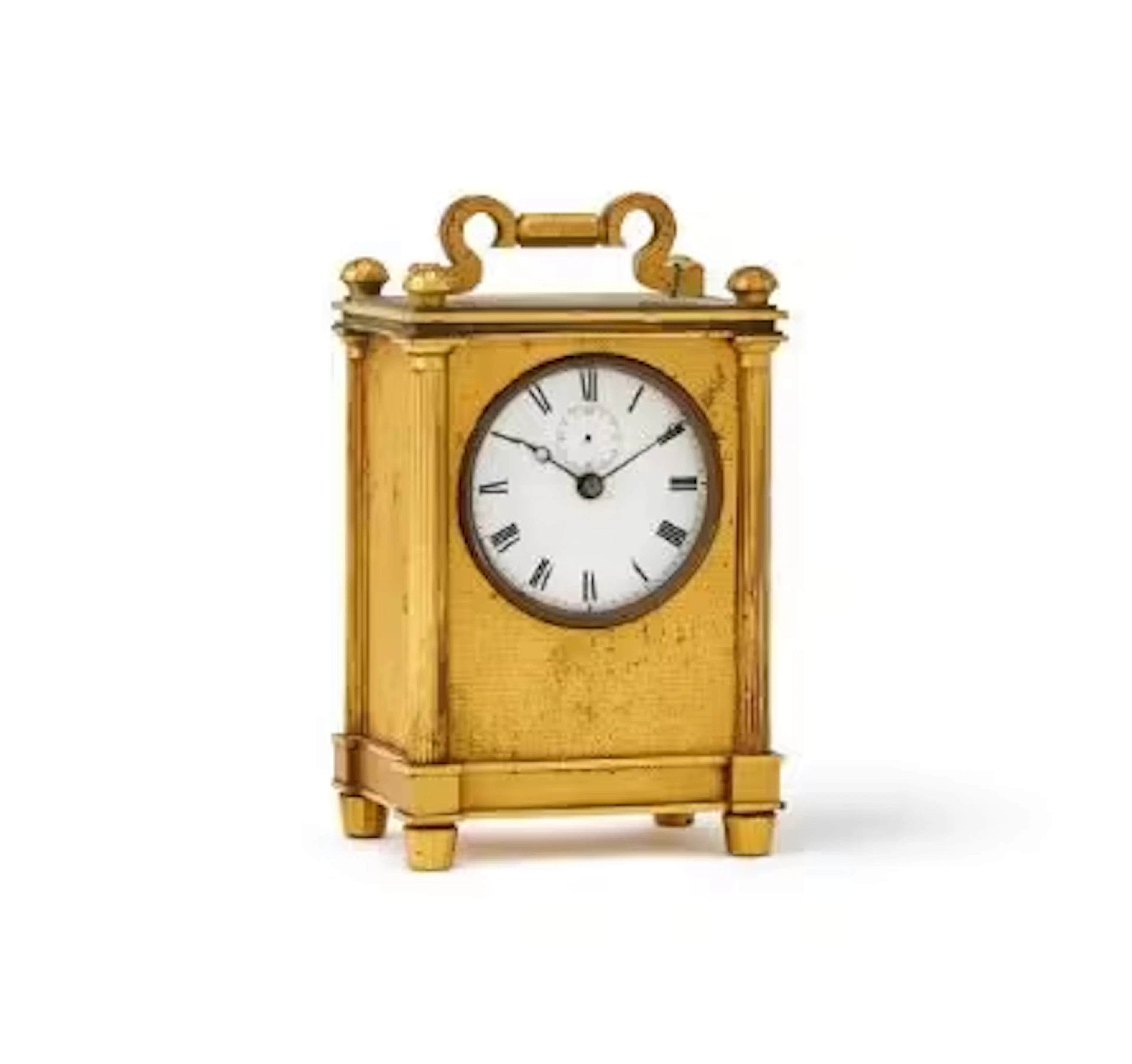 A WILLIAM IV ENGINE-TURNED GILT BRASS CARRIAGE CLOCK IN THE MANNER