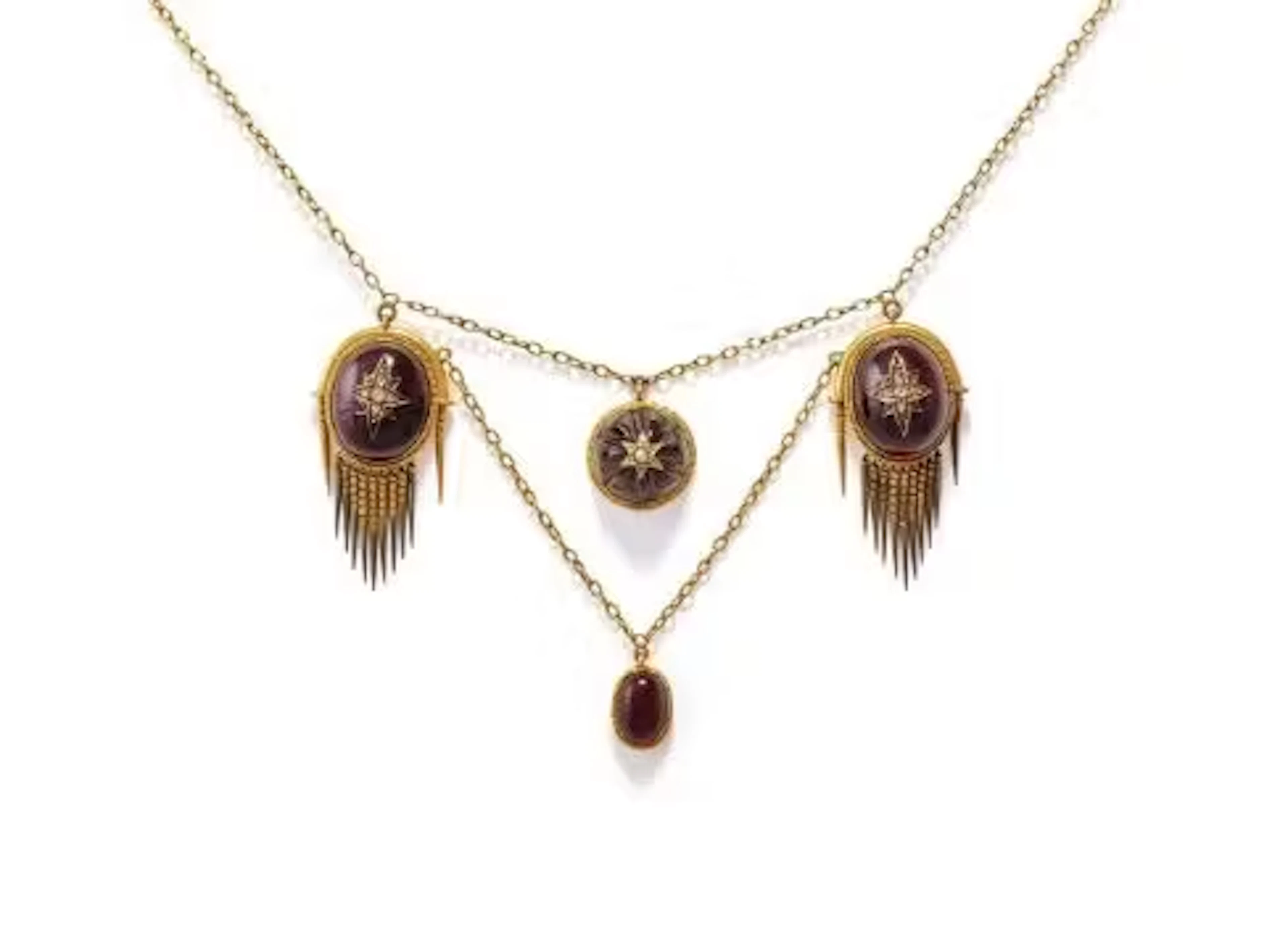 A GARNET AND DIAMOND SWAG NECKLACE
