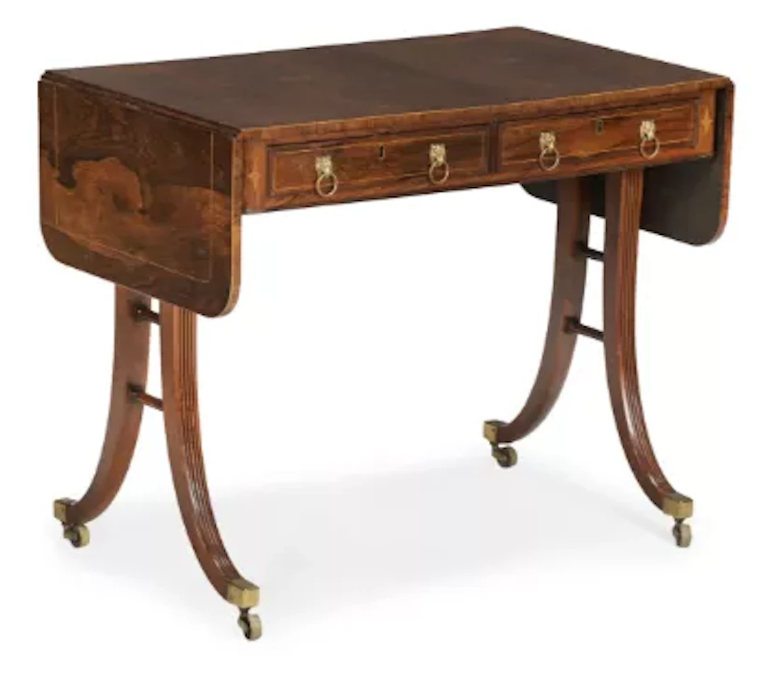 Y A REGENCY ROSEWOOD AND CROSSBANDED SOFA TABLE, IN THE MANNER OF