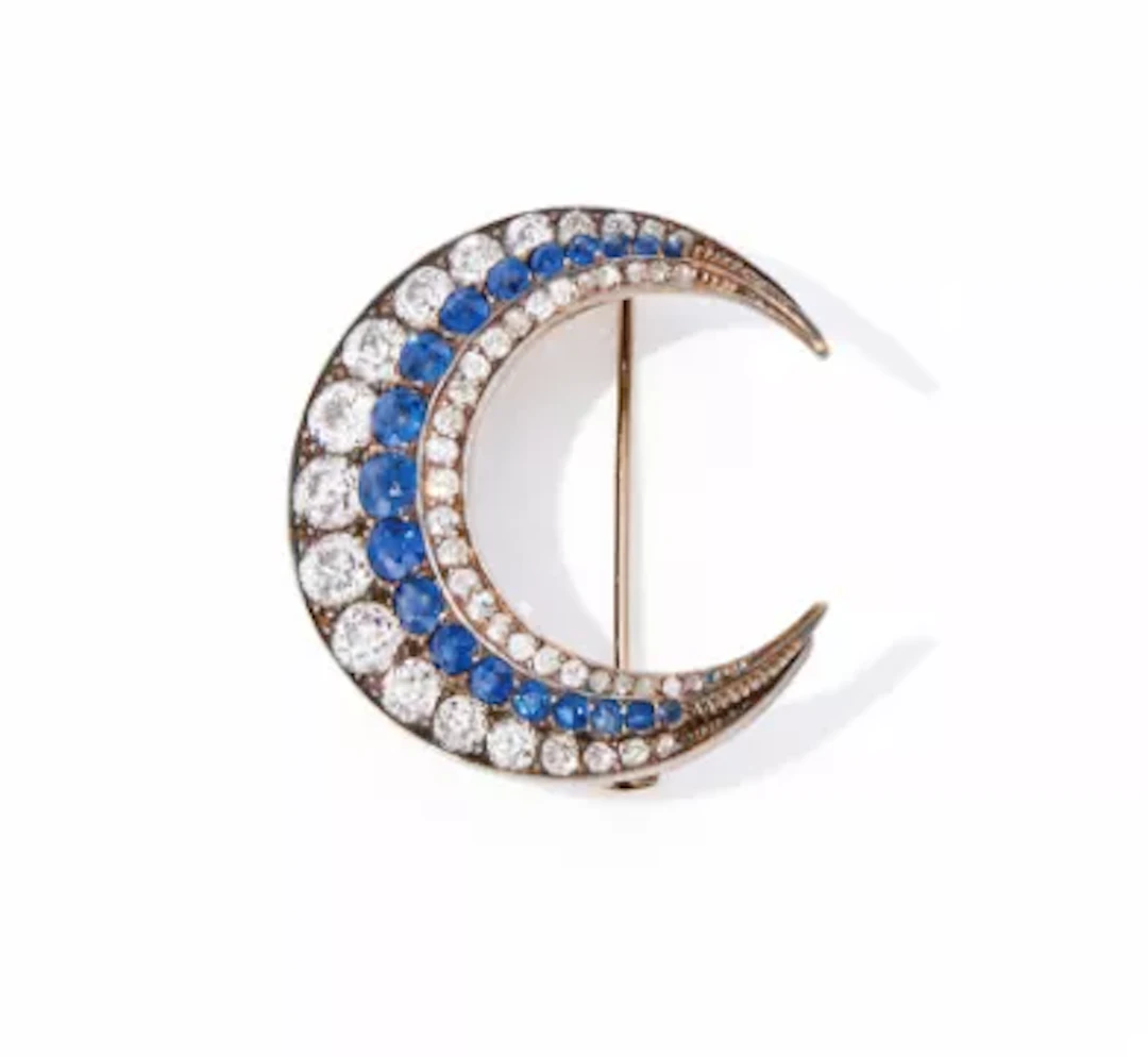 A VICTORIAN SAPPHIRE AND DIAMOND CRESCENT BROOCH