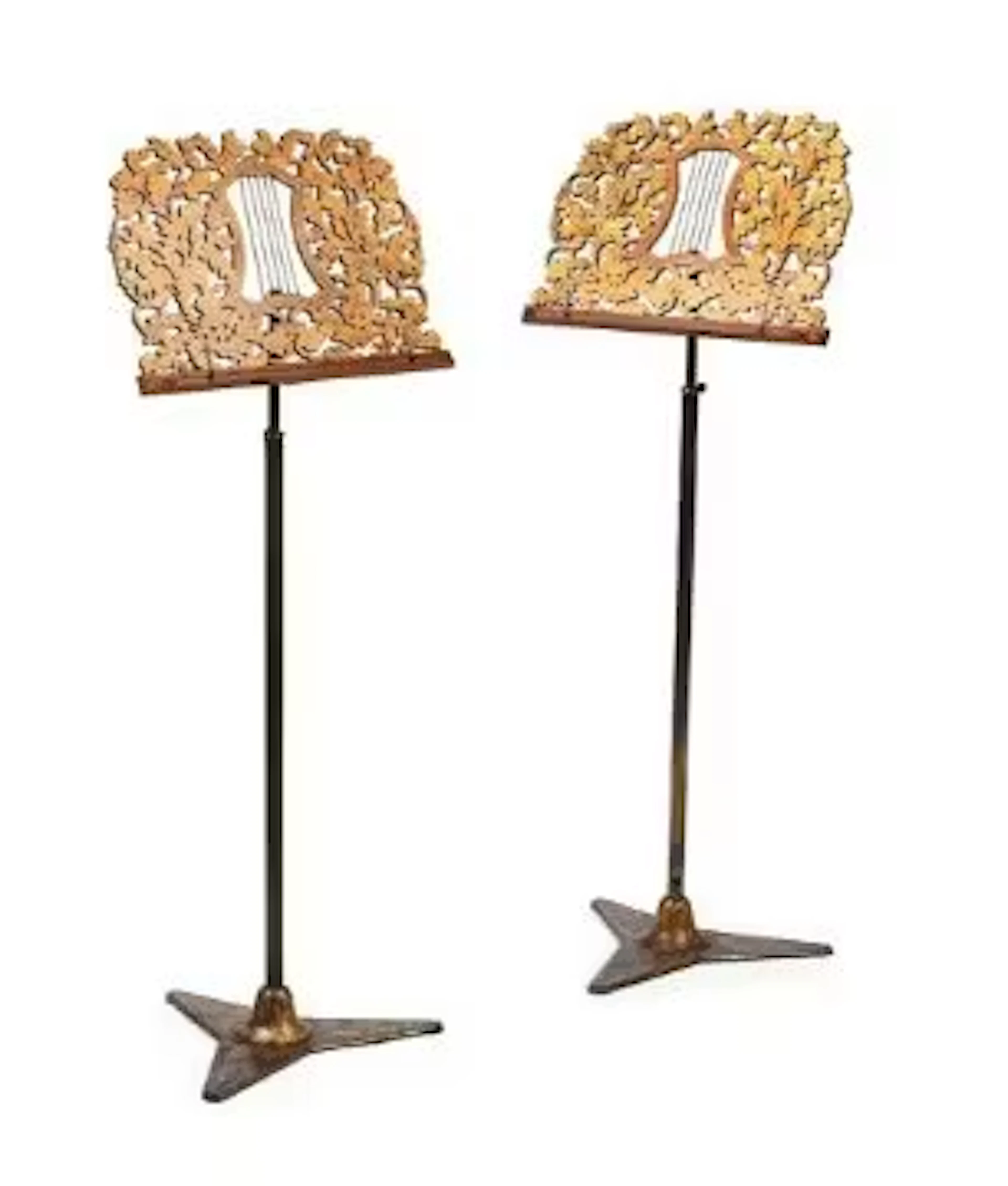 A PAIR OF GEORGE IV FRET CARVED GILTWOOD, JAPANNED AND BRASS ADJUSTABLE