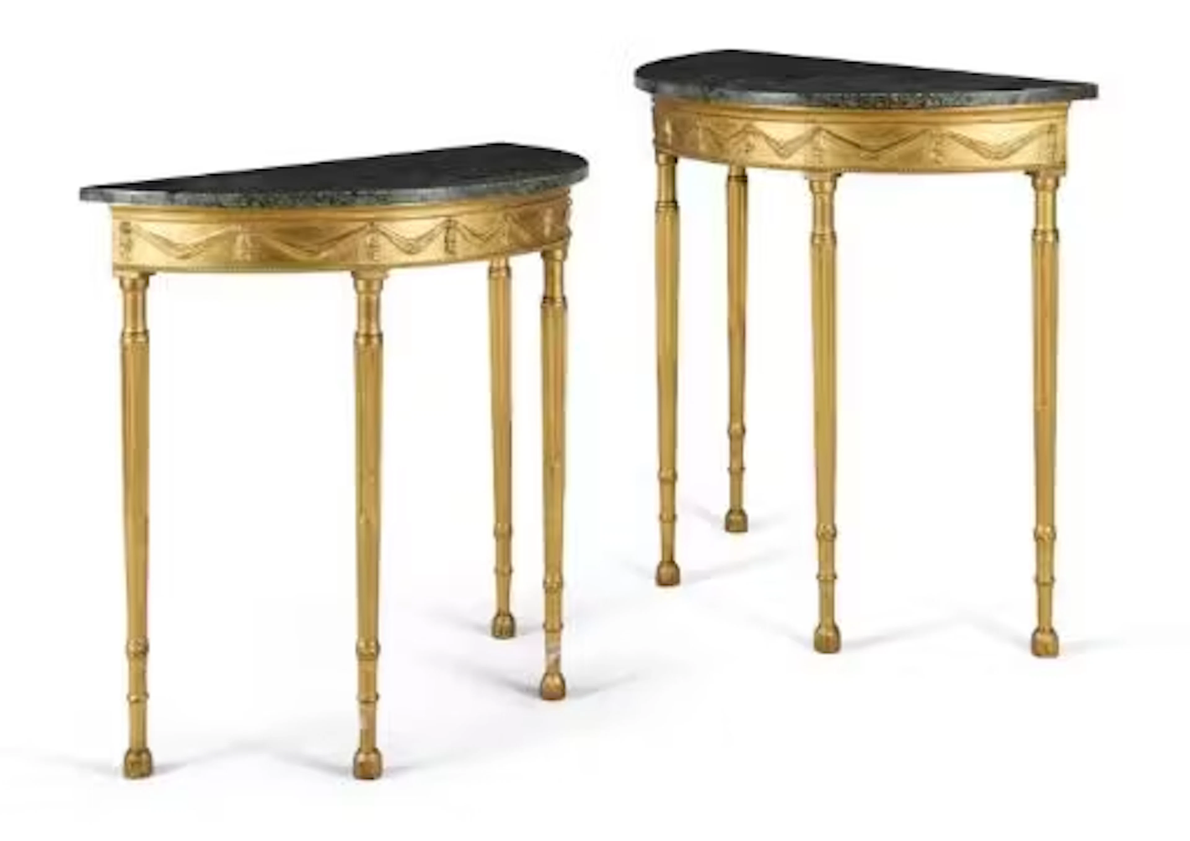 ‡ A PAIR OF GEORGE III GILTWOOD DEMI-LUNE SIDE TABLES, IN THE MANNER