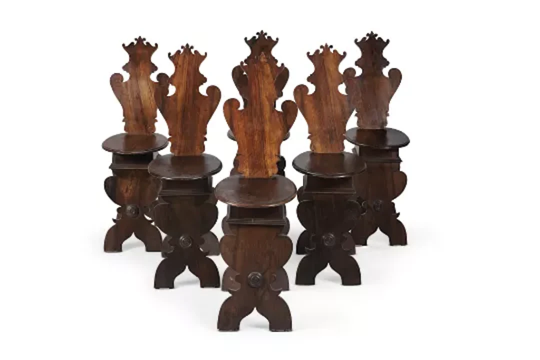 A SET OF SIX ITALIAN WALNUT SGABELLO HALL CHAIRS, 19TH CENTURY