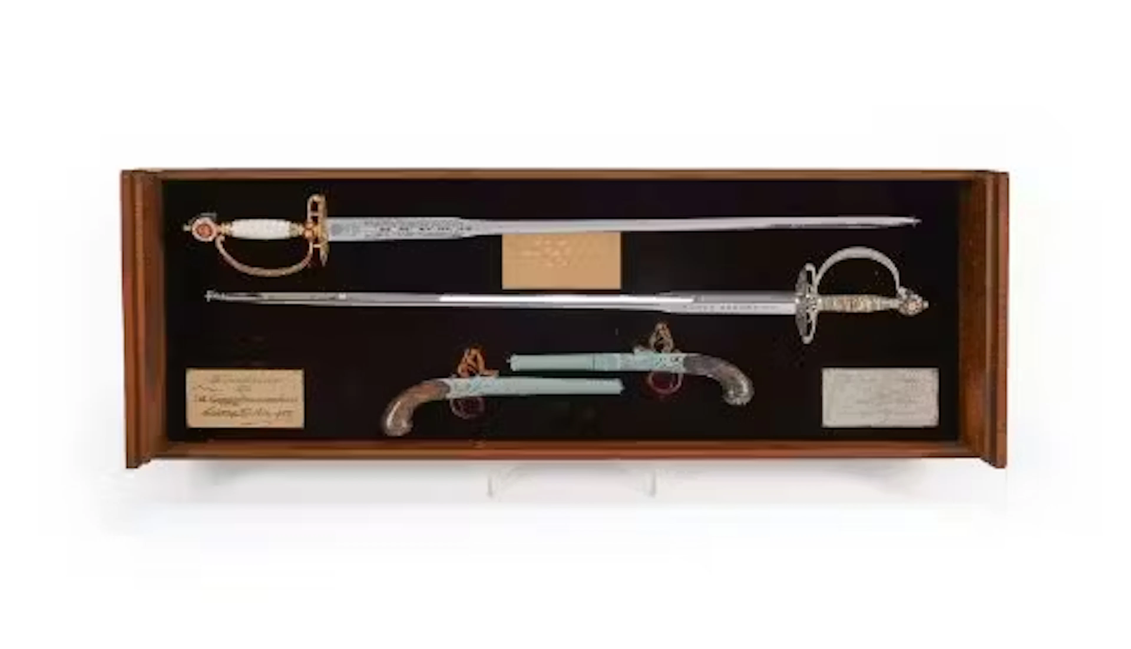 A COMMEMORATIVE PAIR OF SWORDS AND PISTOLS IN DISPLAY CASE