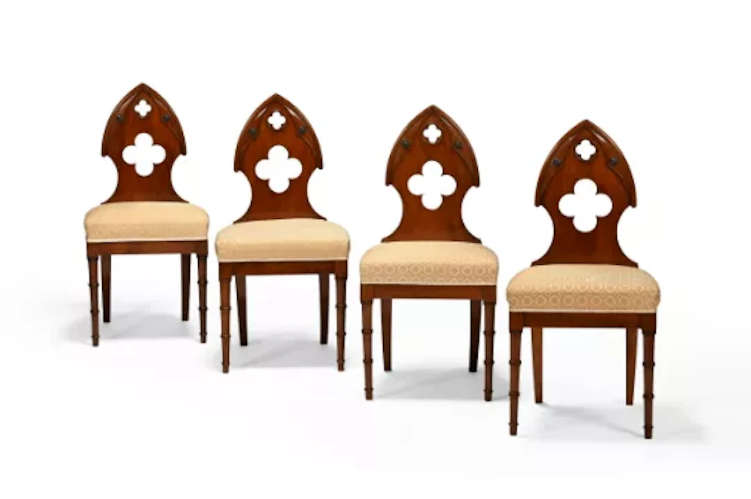 Y A SET OF FOUR WALNUT GOTHIC HALL CHAIRS, EARLY 19TH CENTURY