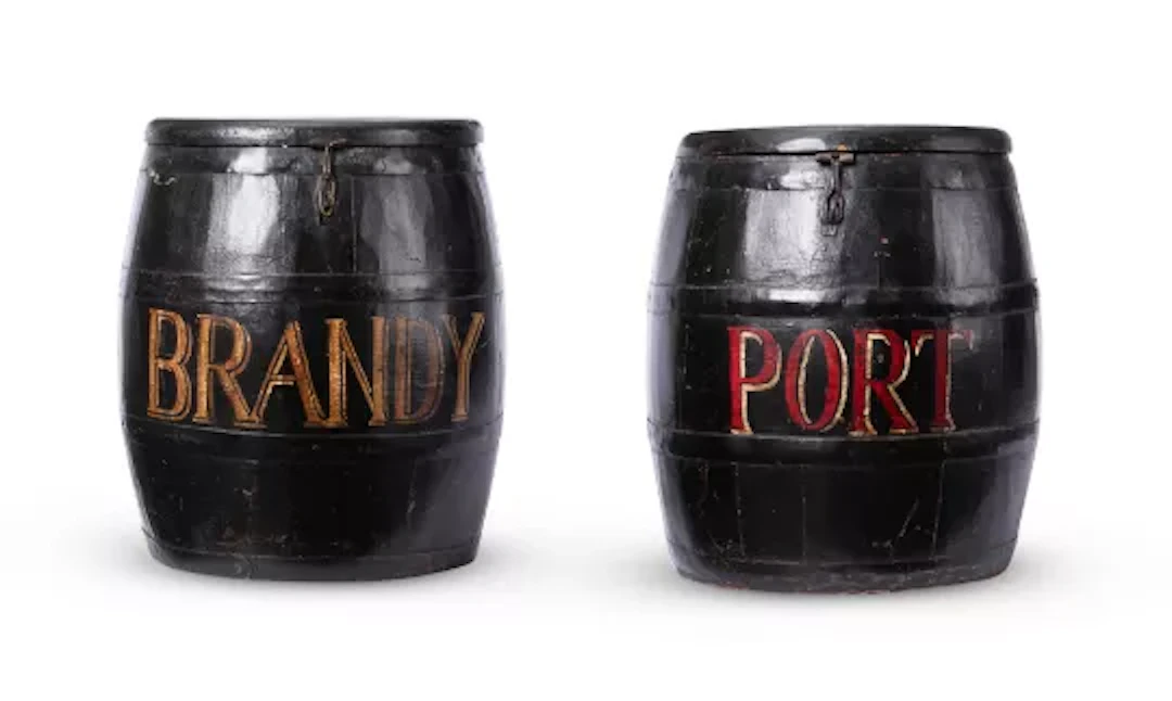 A PAIR OF POLYCHROME PAINTED AND IRON BOUND COOPERED BARRELS, 20TH CENTURY