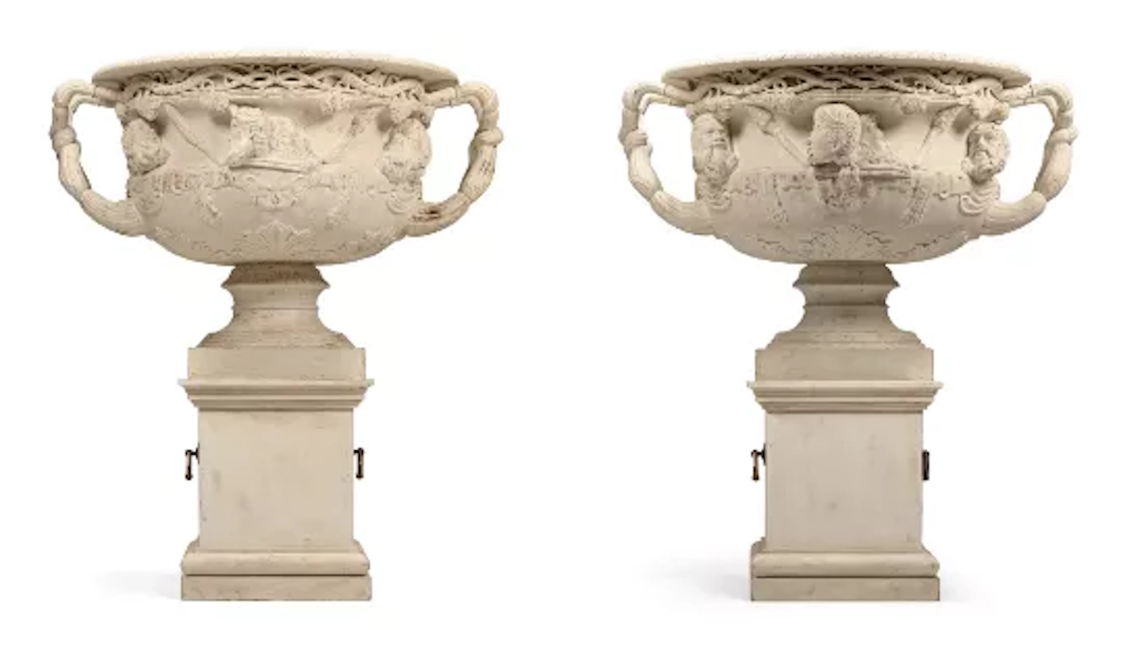 A MONUMENTAL PAIR OF CARVED WOOD AND GESSO PAINTED MODELS OF THE WARWICK