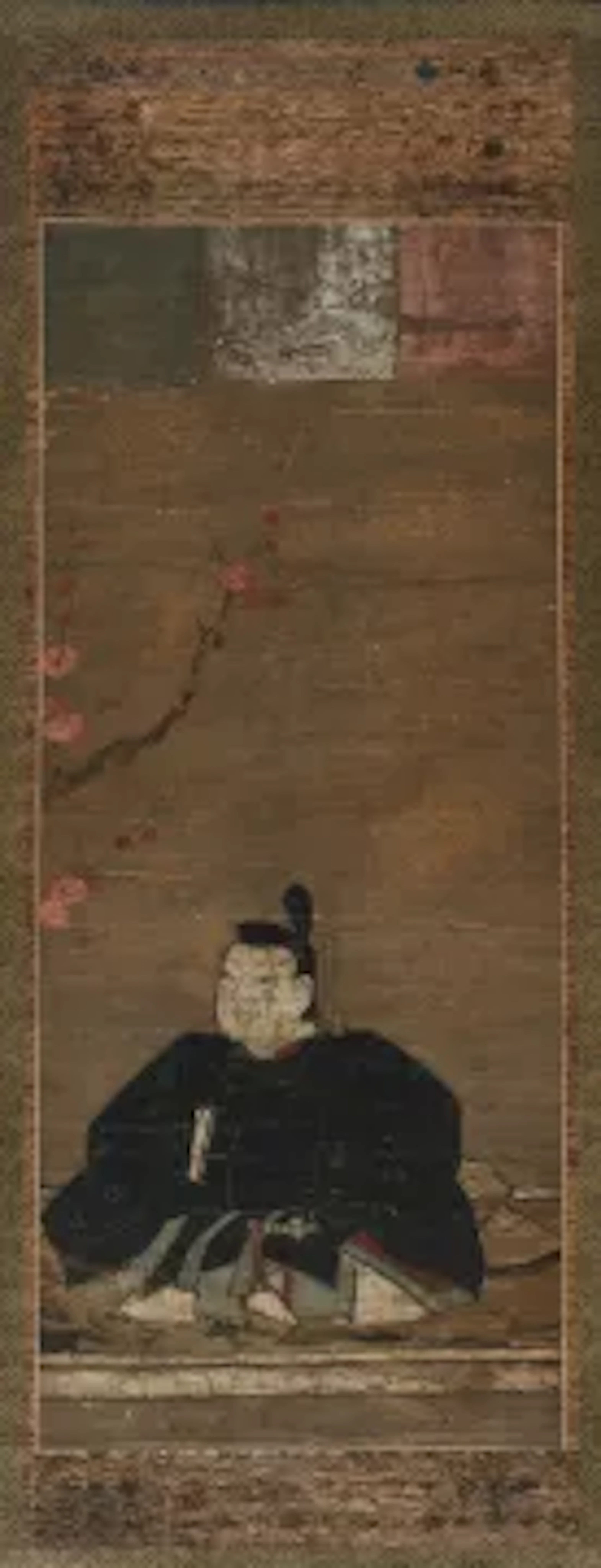A Japanese painting in inks and pigments on textile of a dignitary