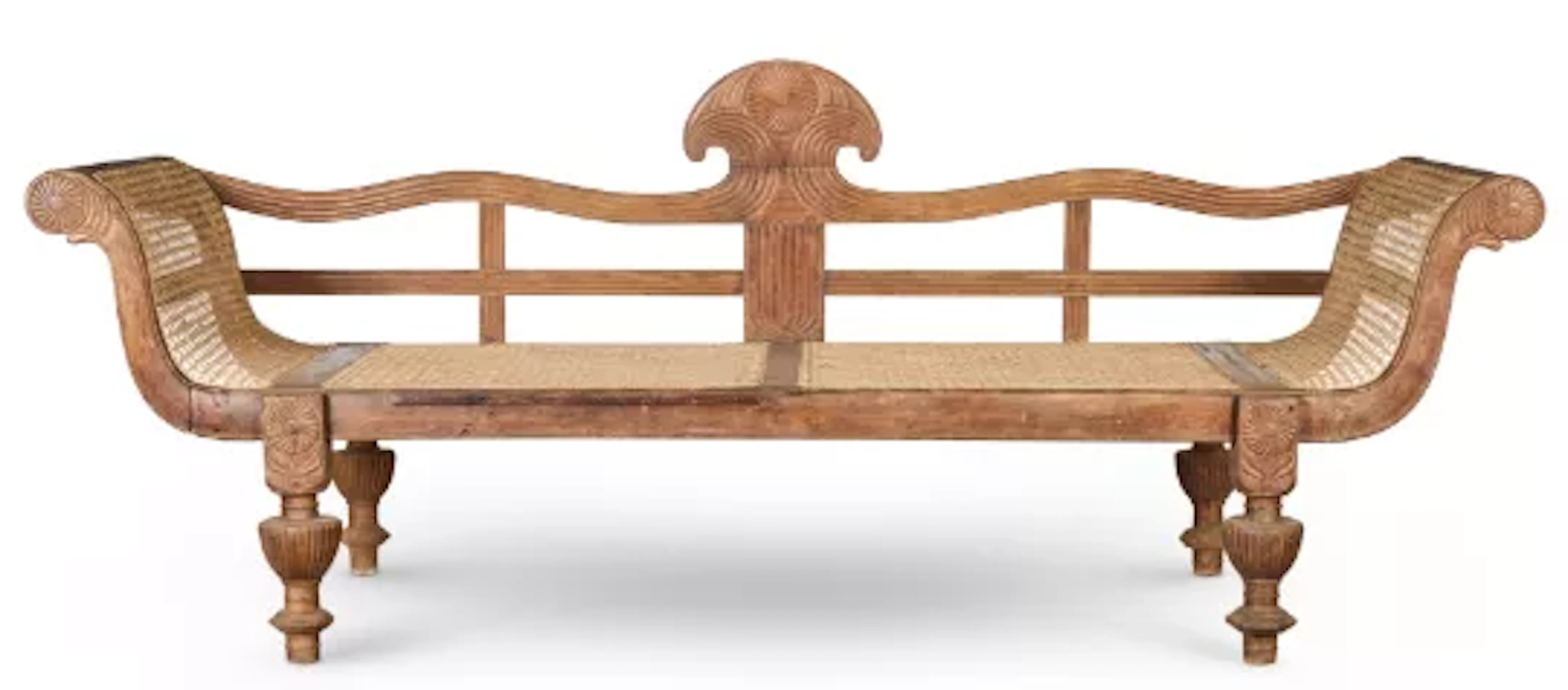 ‡ A CEYLONESE HARDWOOD AND CANED SOFA, CIRCA 1900
