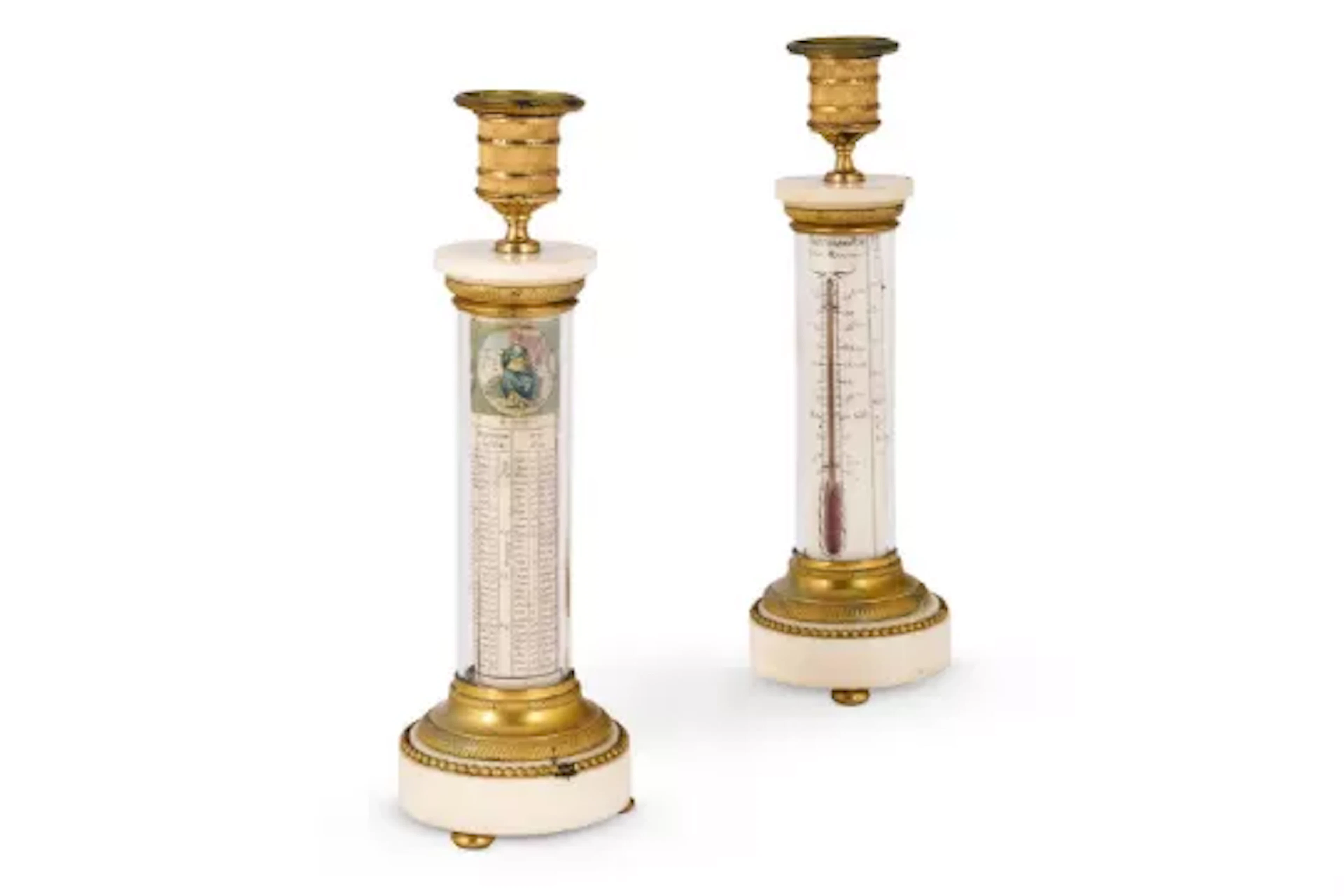 A RARE PAIR OF FRENCH ORMOLU AND WHITE MARBLE CANDLESTICKS