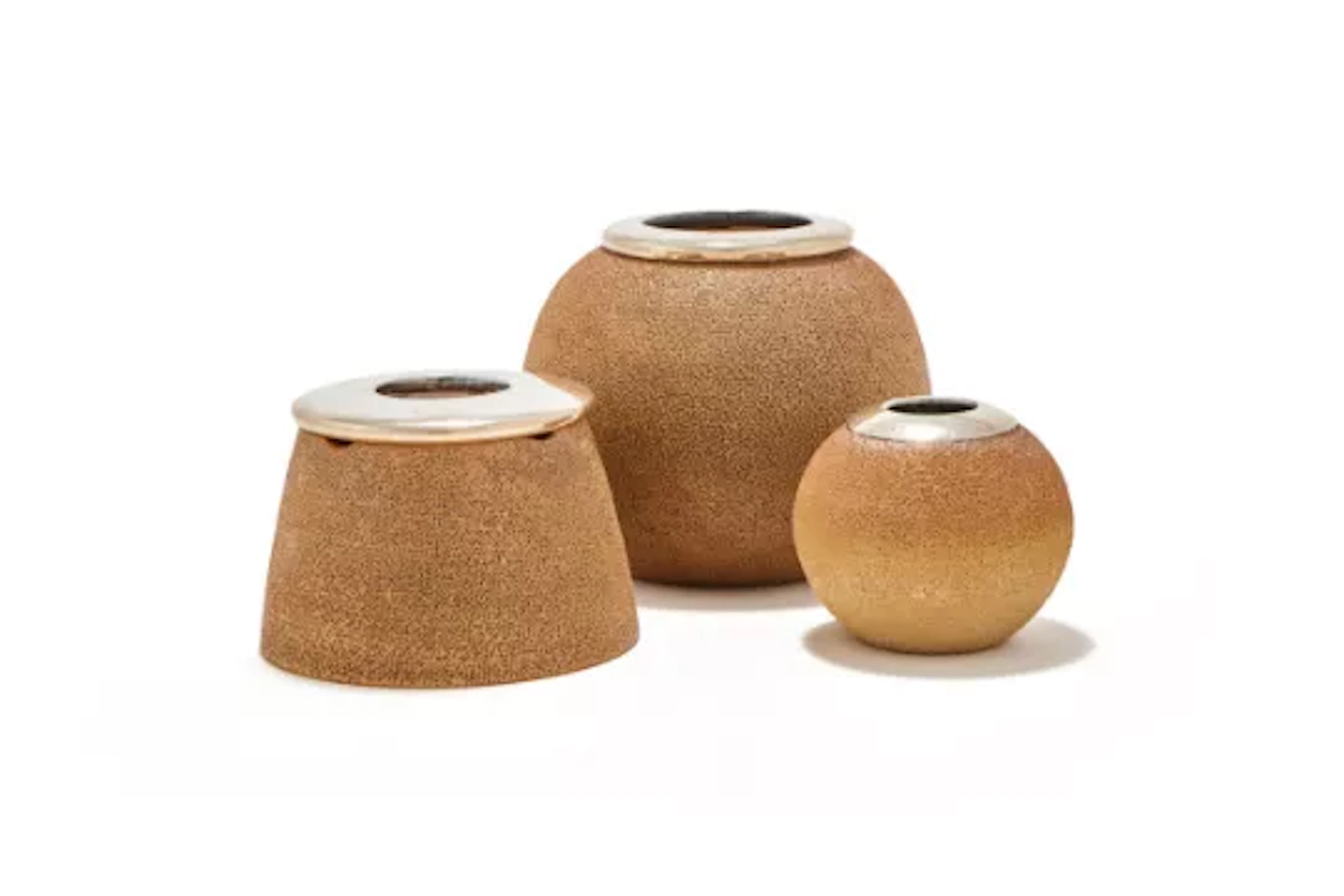 THREE ROYAL DOULTON POTTERY AND SILVER MOUNTED MATCH STRIKERS
